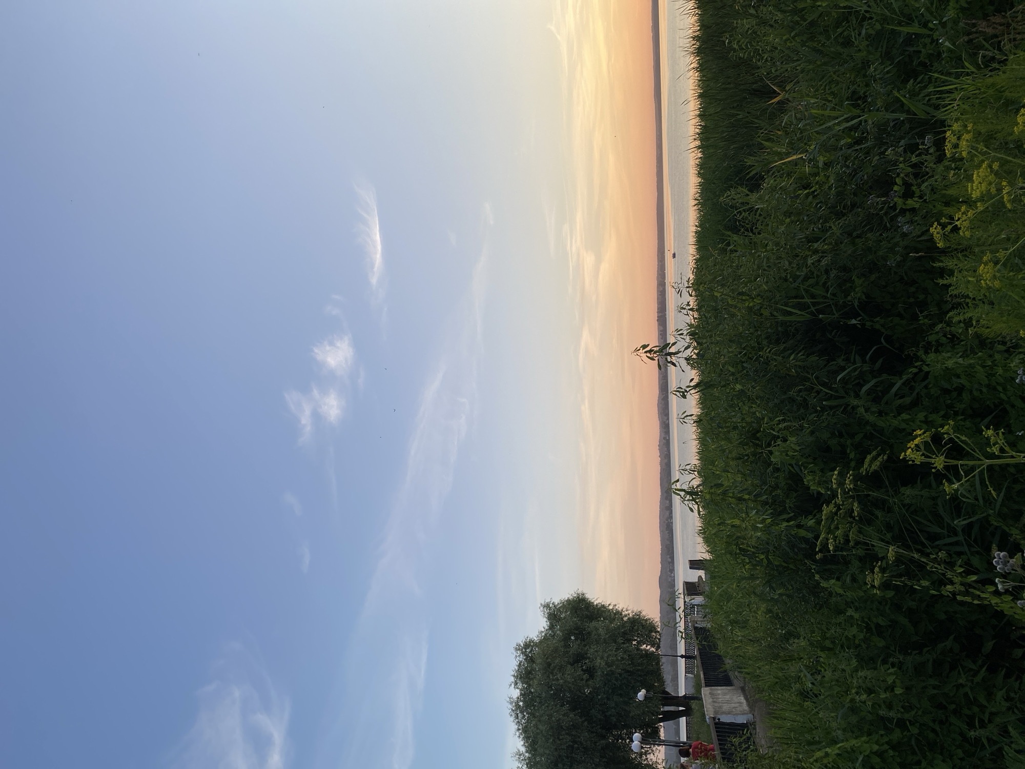 Sunset evening at the Votkinsk Reservoir, pedal boats docked