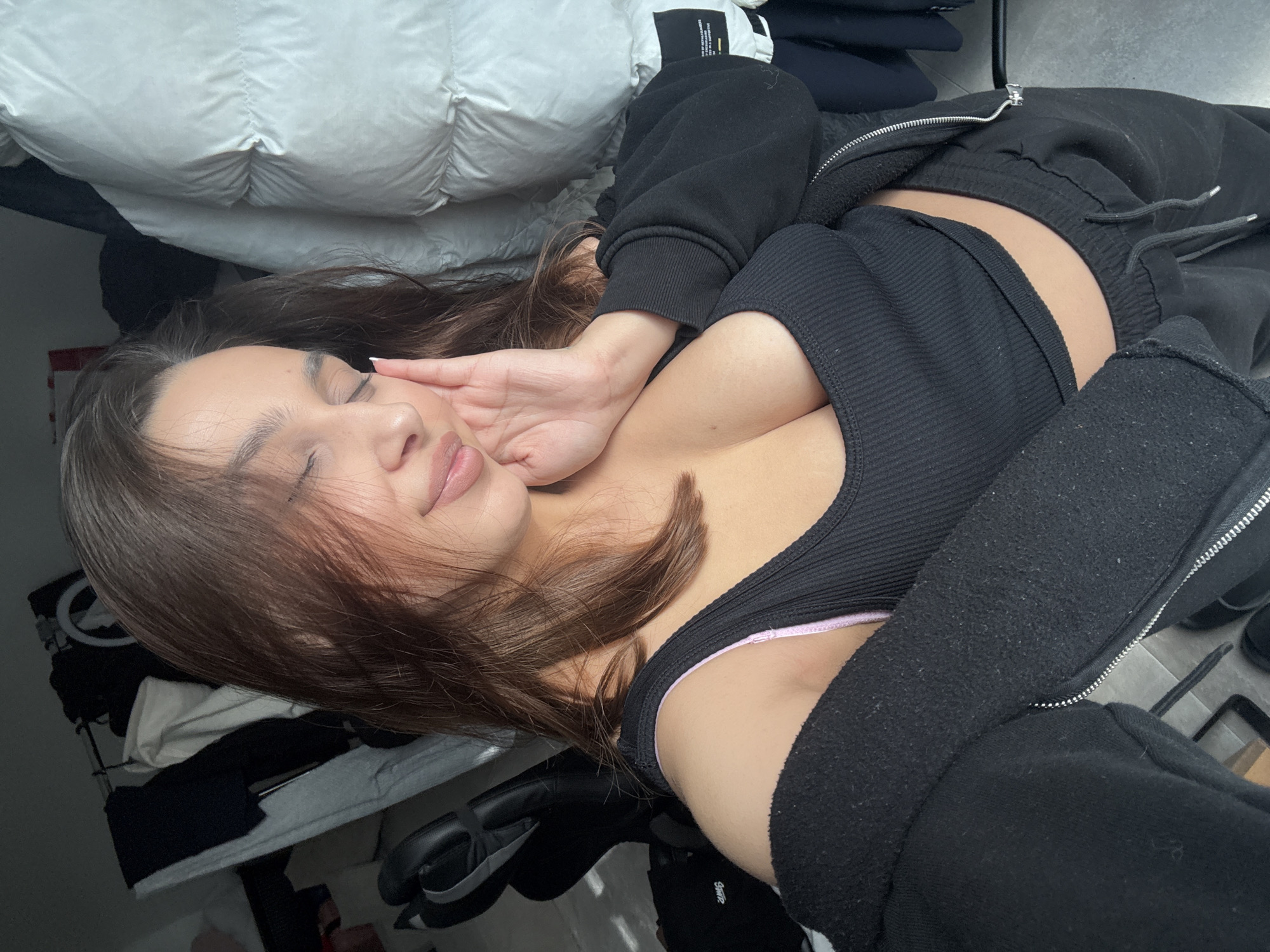 Woman rests peacefully indoors in Mönchengladbach