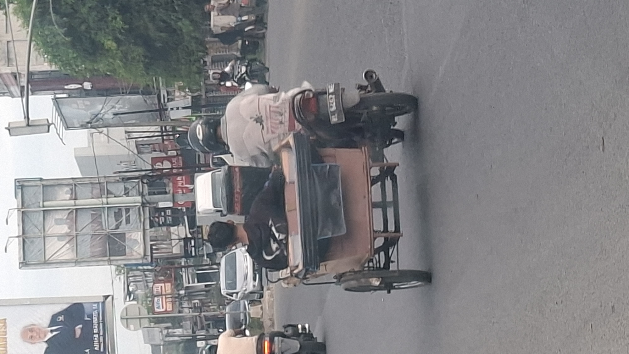 Everyday street traffic and cargo movement in Lhokseumawe, Indonesia