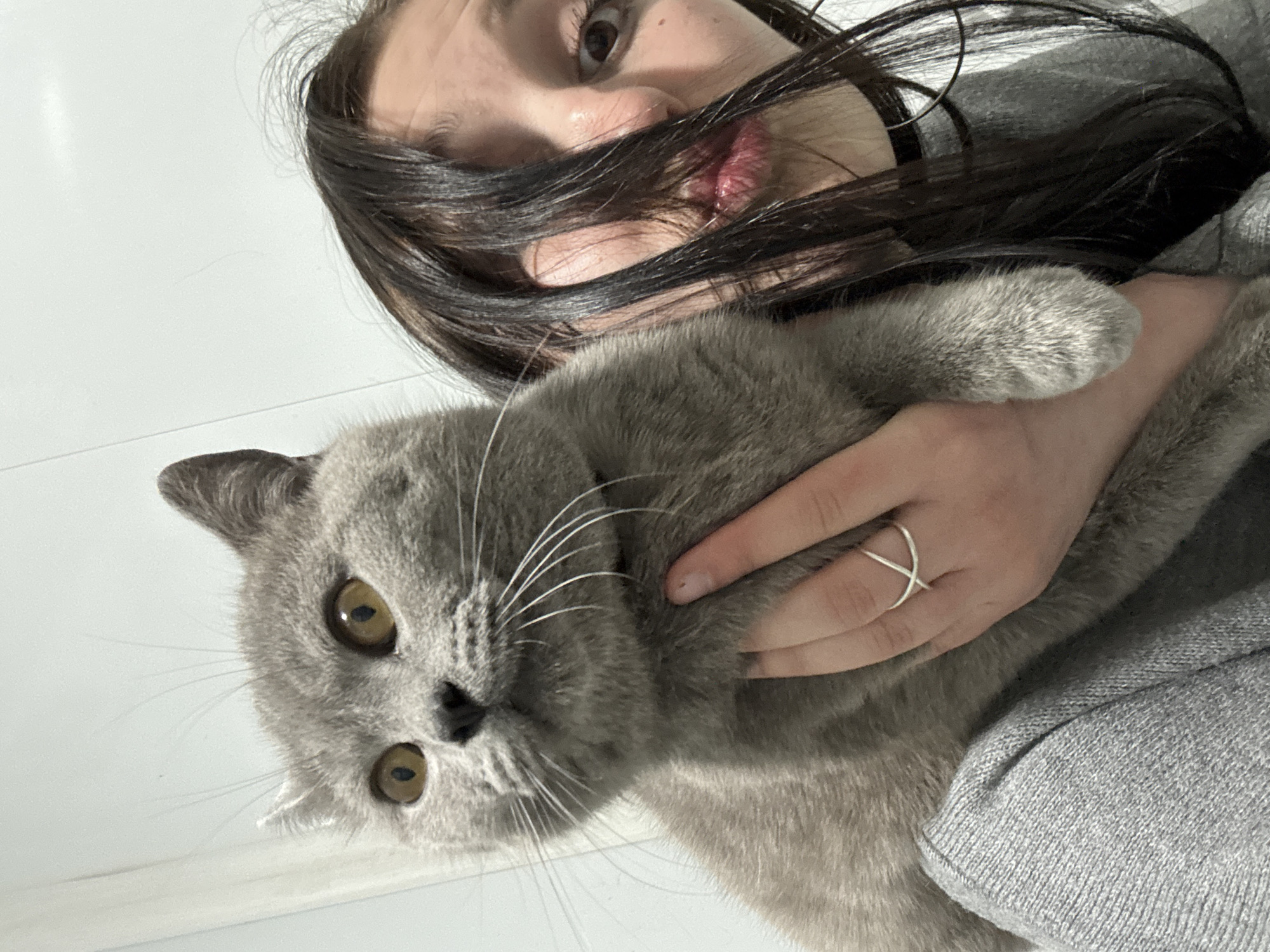 Woman Takes Tender Selfies With Gray Cat in Russian Village