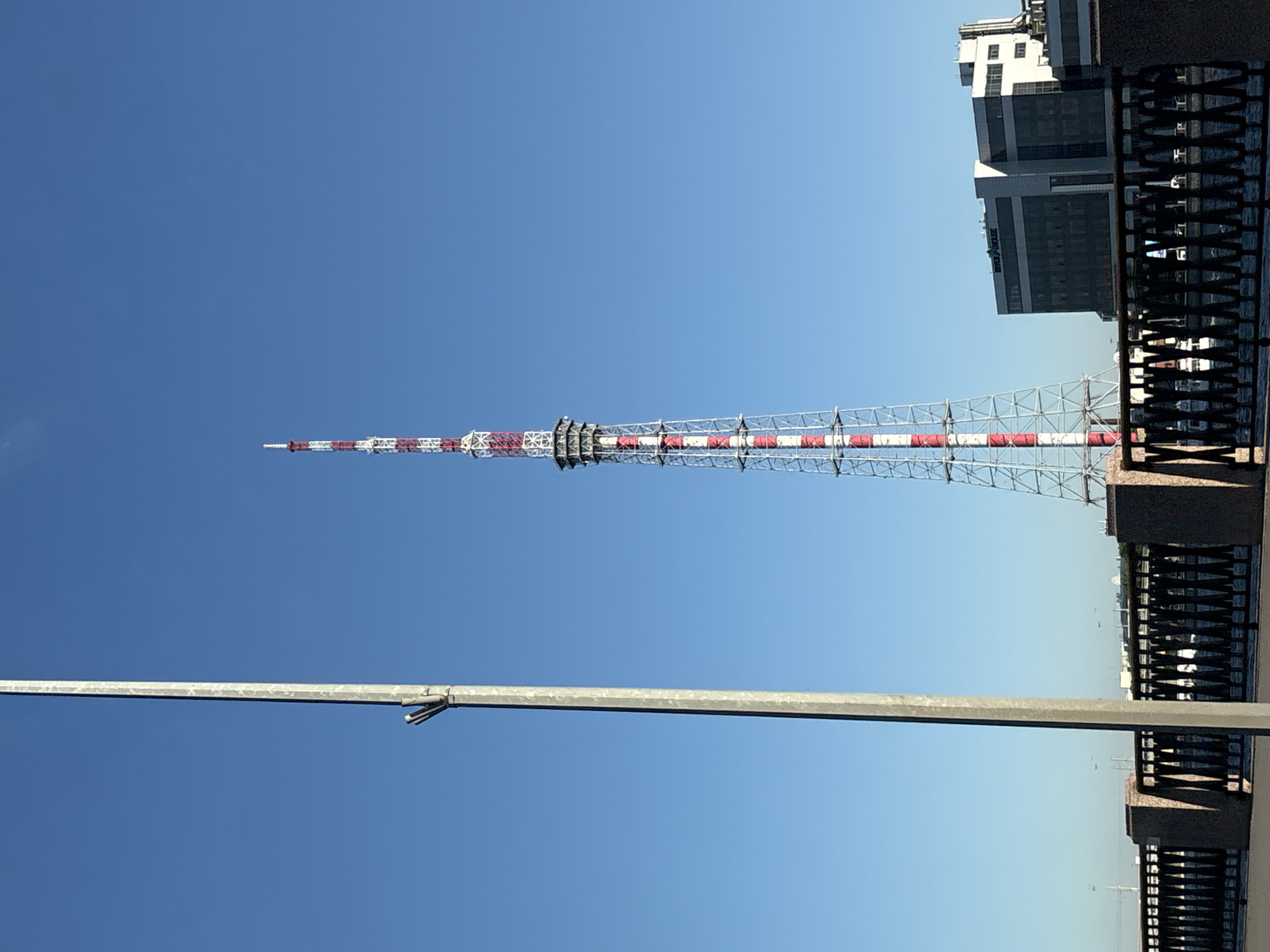 Red striped TV tower photographed in Saint Petersburg