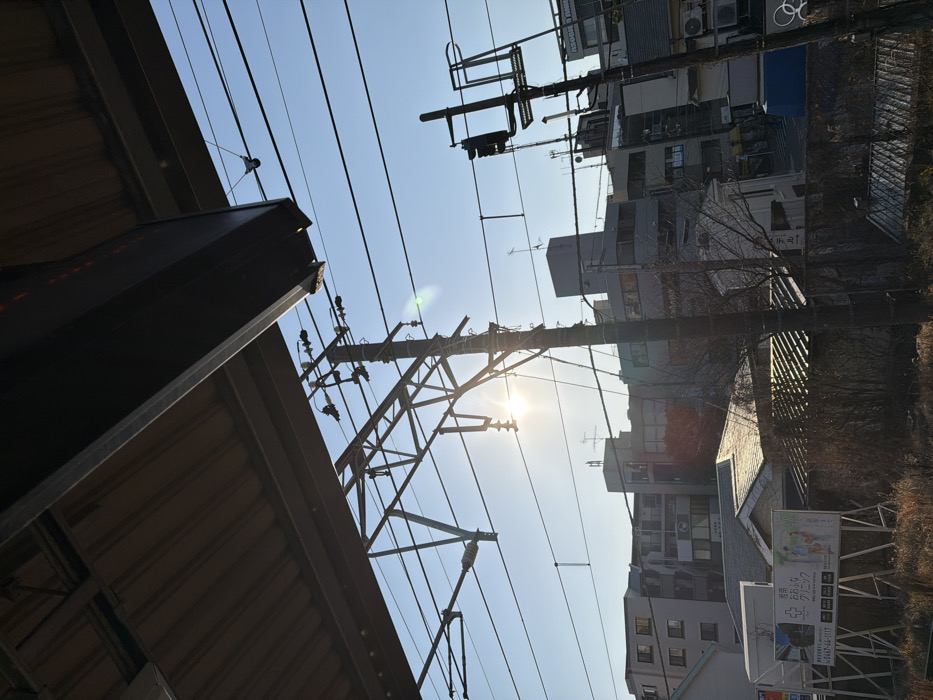 Morning infrastructure documentation in Kamakura shows power lines, poles