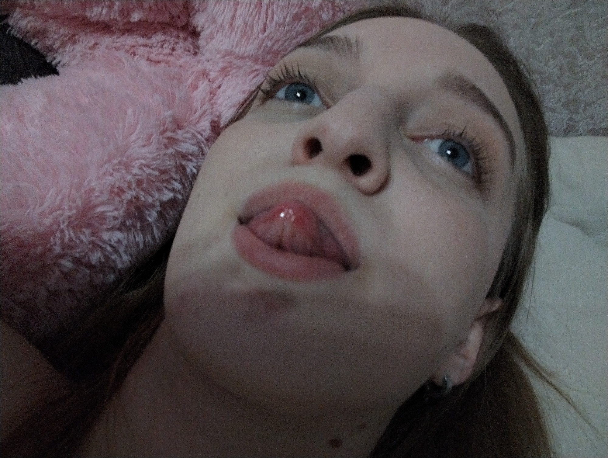 Woman takes selfies at home in Saratov, Russia