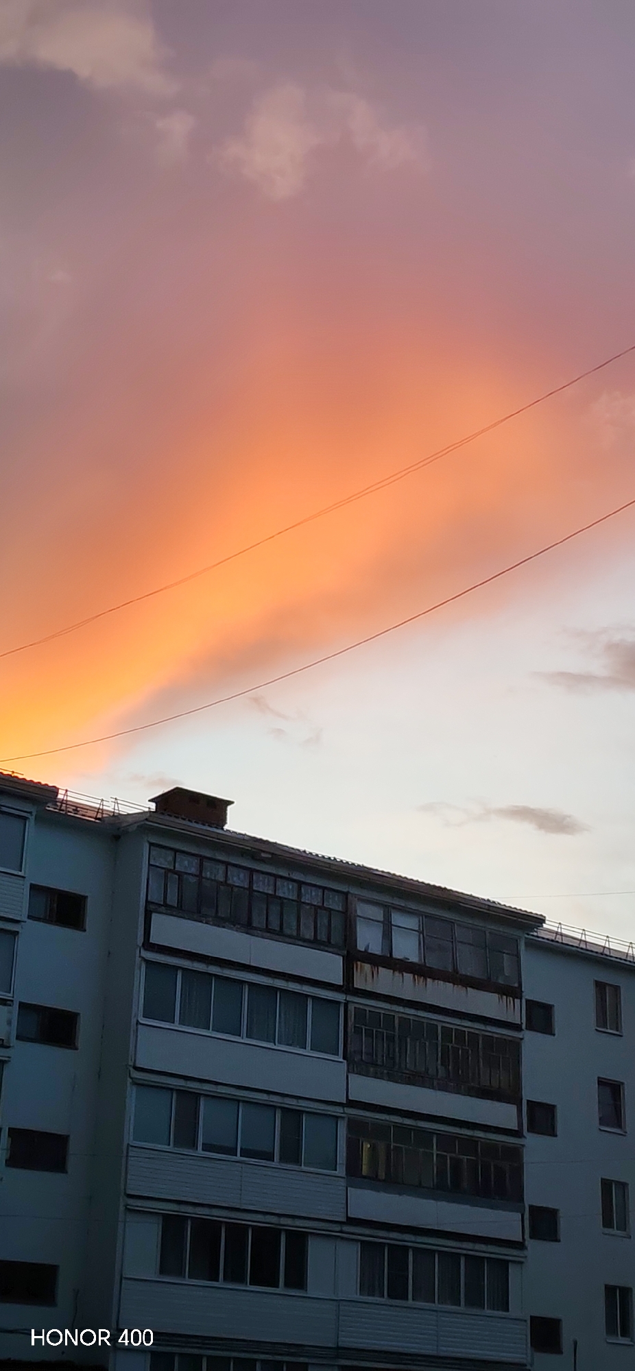 Dramatic sunset captured over residential Noviy, Russia