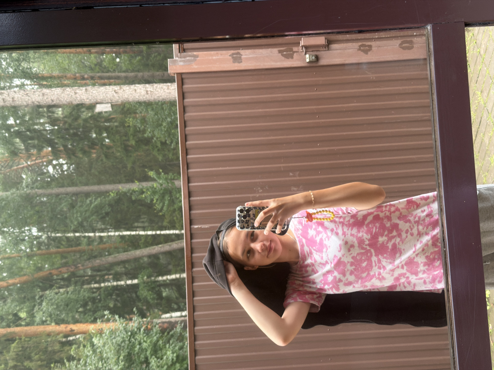 Quiet July morning in Chaikovsky — cat, greenery, and a selfie