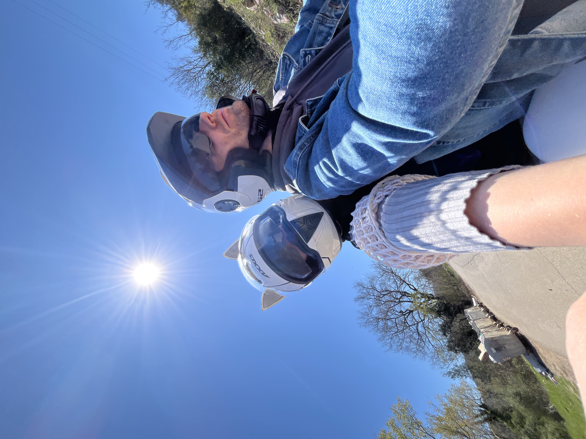 Motorcyclists with cat-ear helmet spotted riding through rural Montenegro