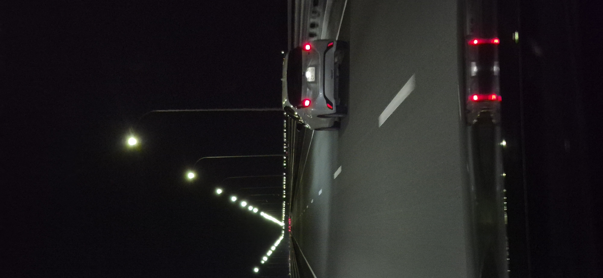 Night drive through lit-up Vladivostok highways