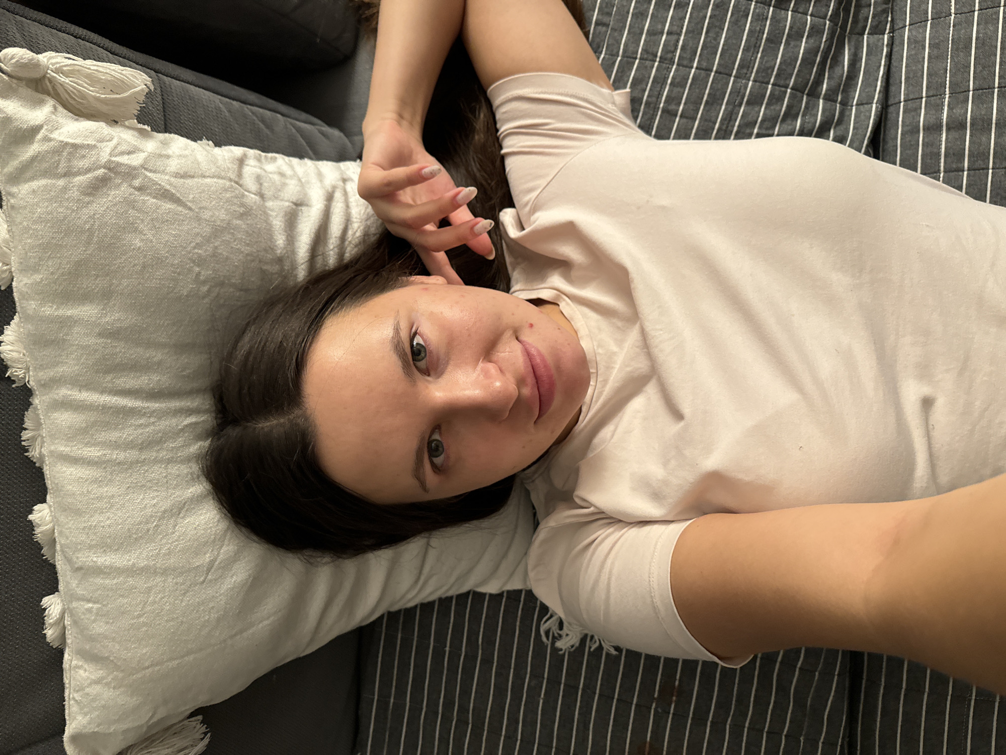 Woman photographed at home with cat in Odintsovo