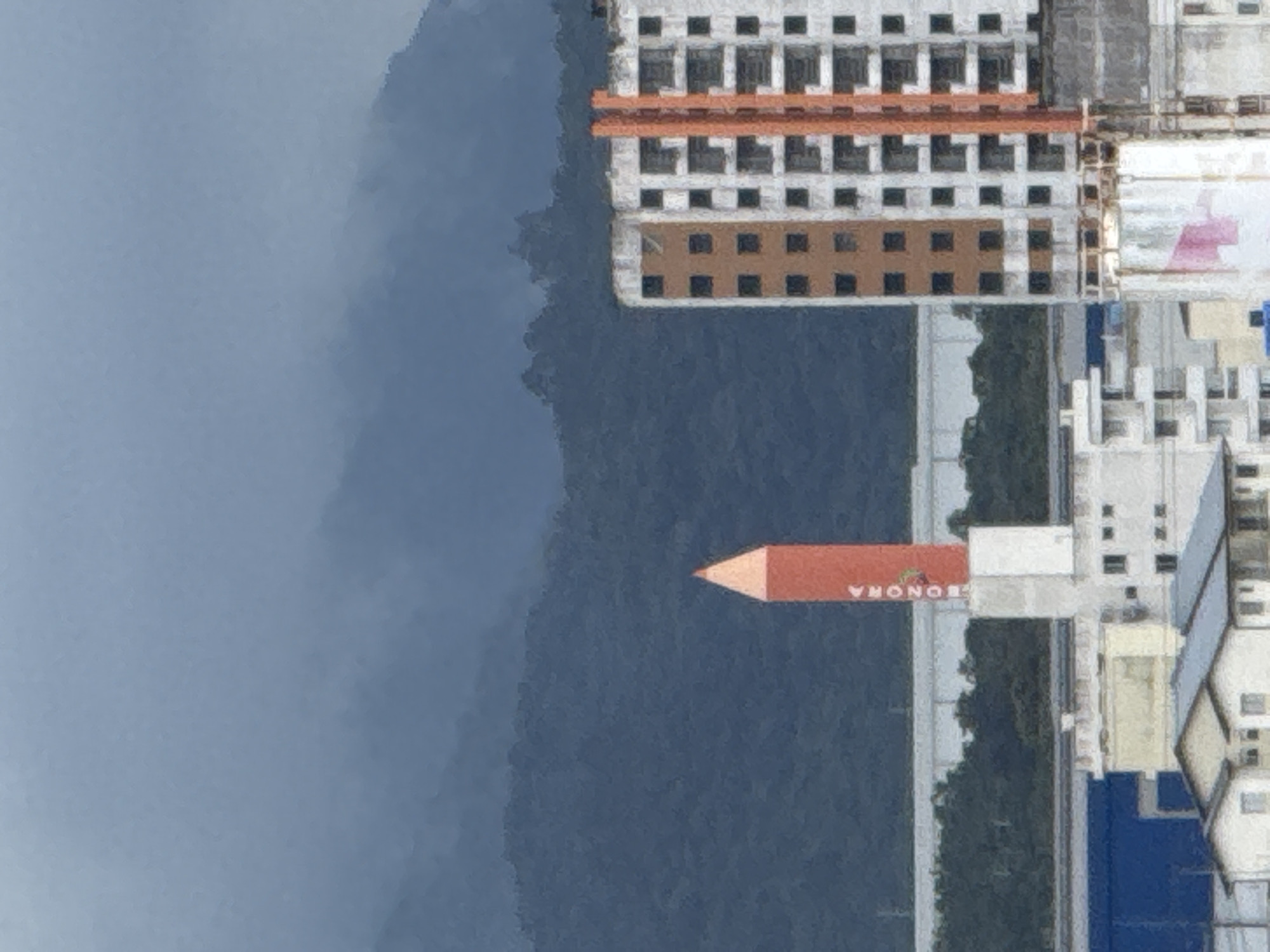 Overcast skies over Sonora's skyline, mountains, and landmark pencil