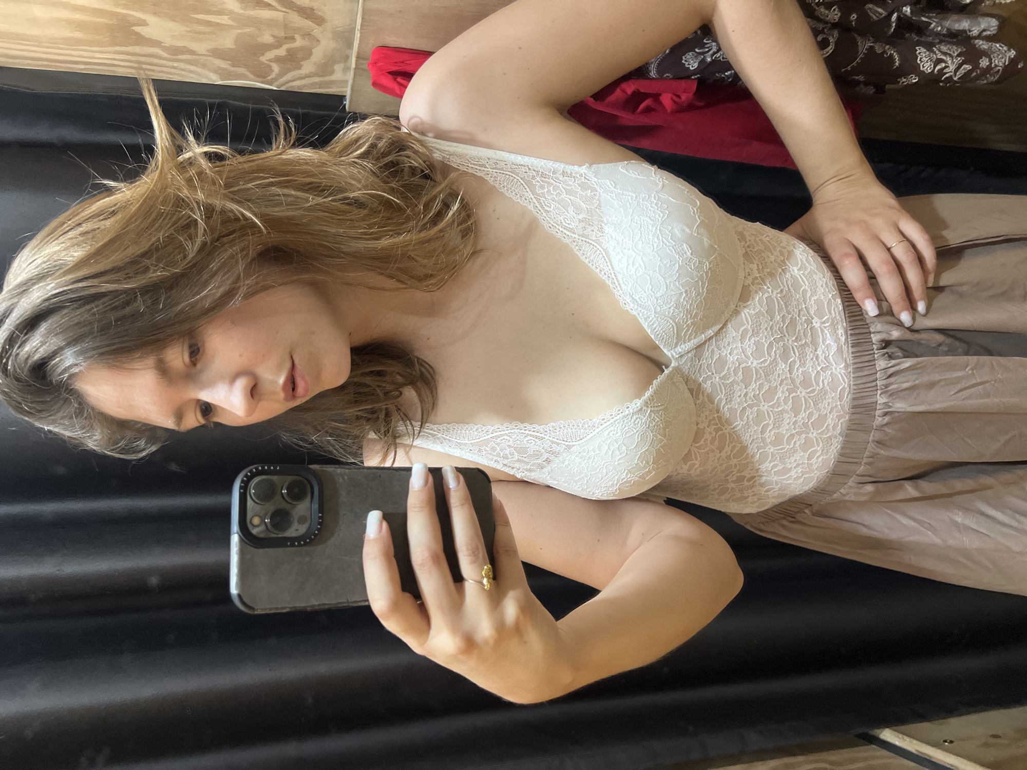 Woman takes fitting room selfies while shopping in Podgorica