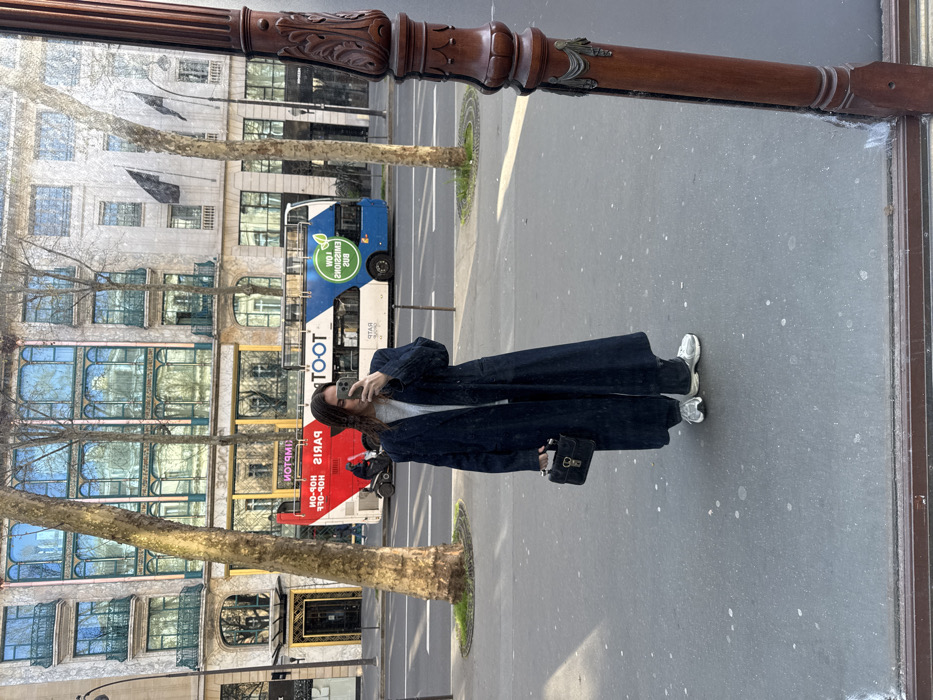 Person documented walking near Opéra Garnier in Paris
