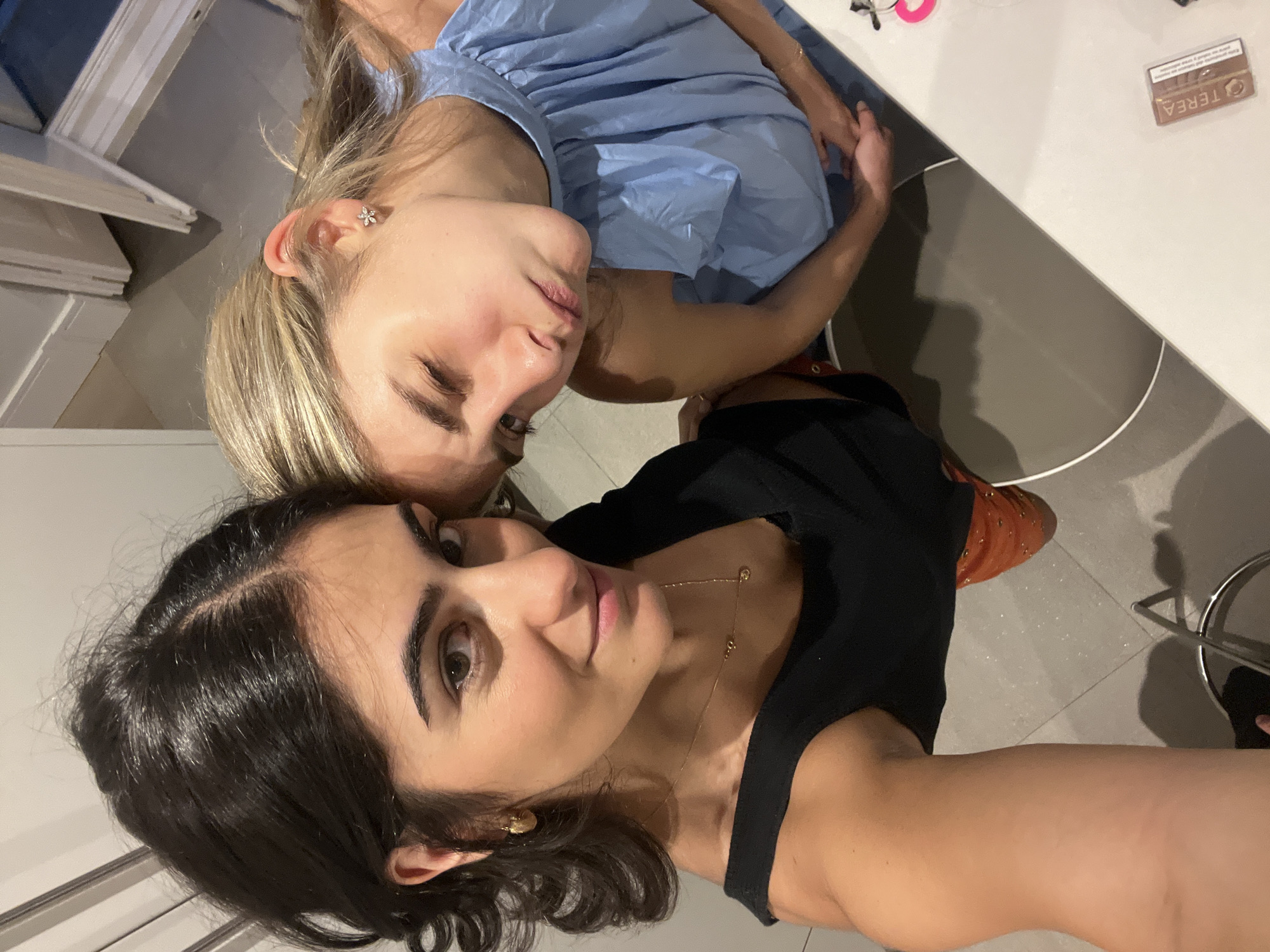 Friends gather for casual pasta dinner in Madrid kitchen