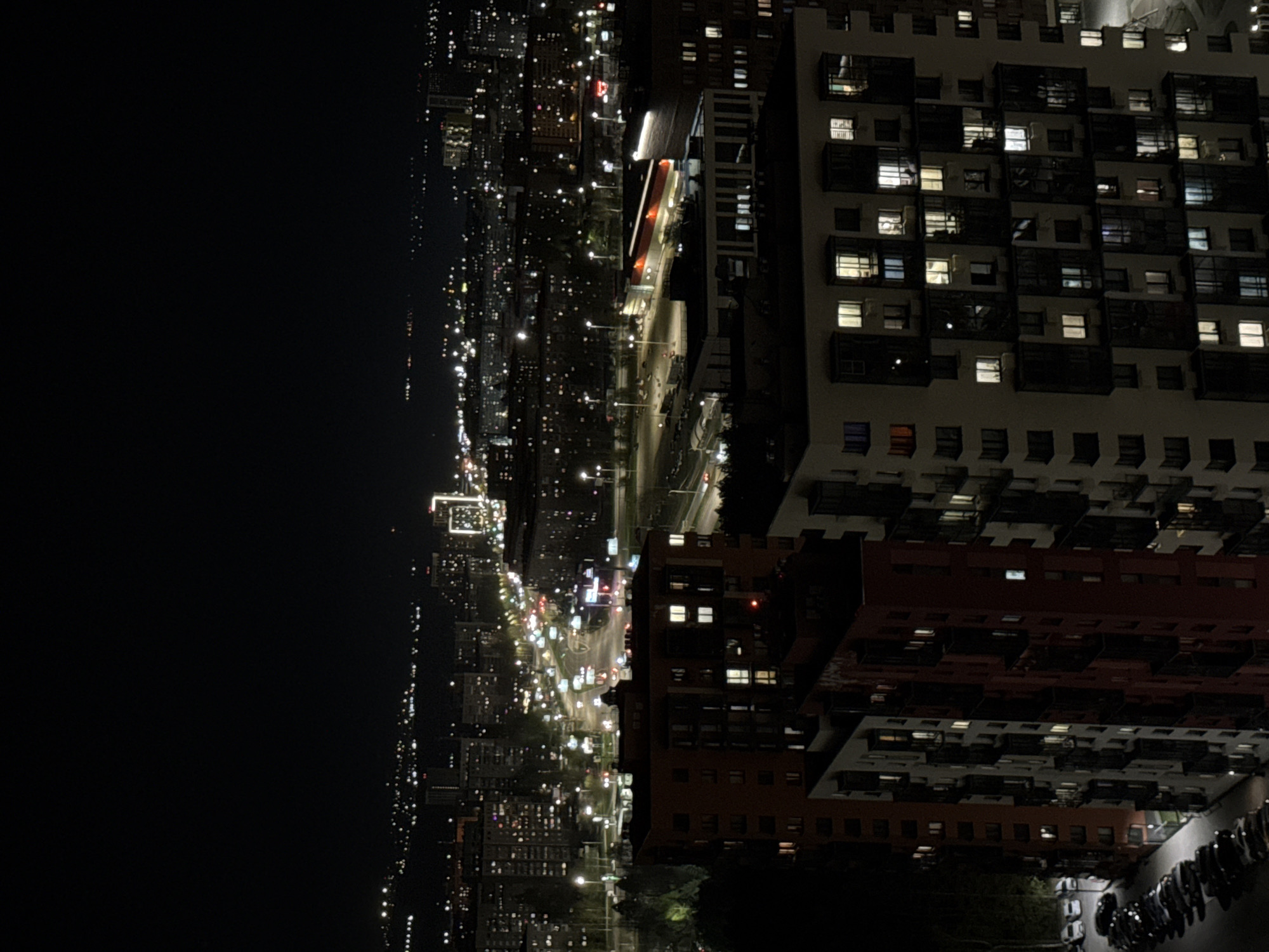 Nighttime aerial view captures illuminated Izhevsk cityscape