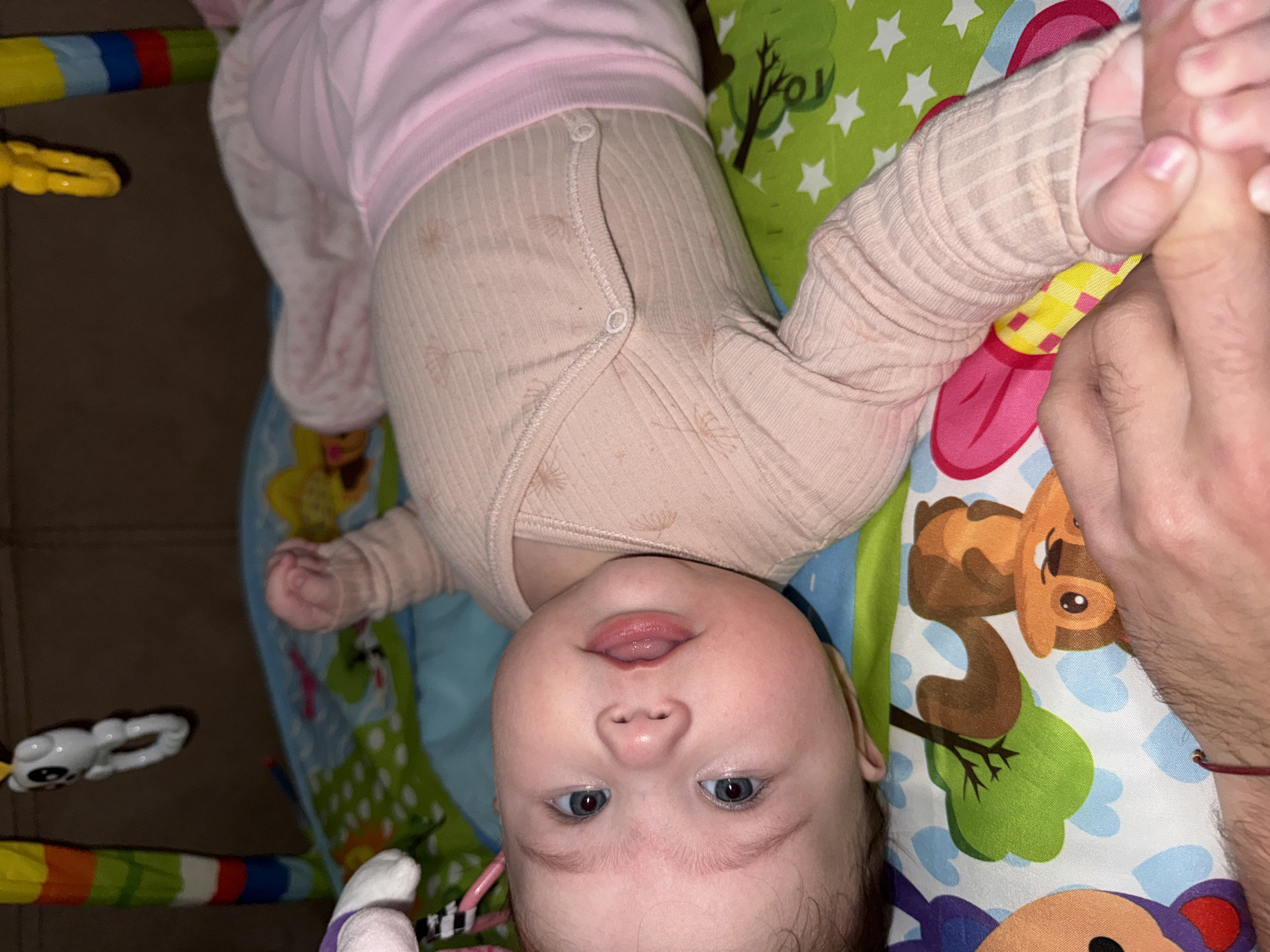 Baby playtime on colorful mat in Pleven