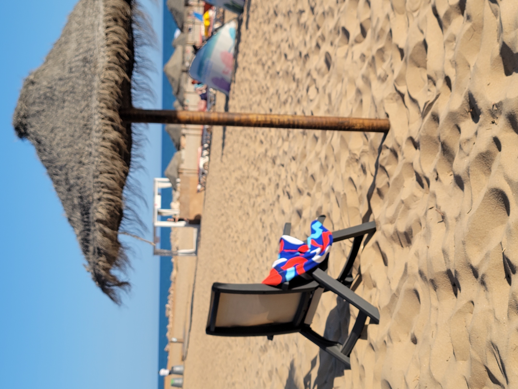 Sunny afternoon scenes across Quarteira's beach and streets