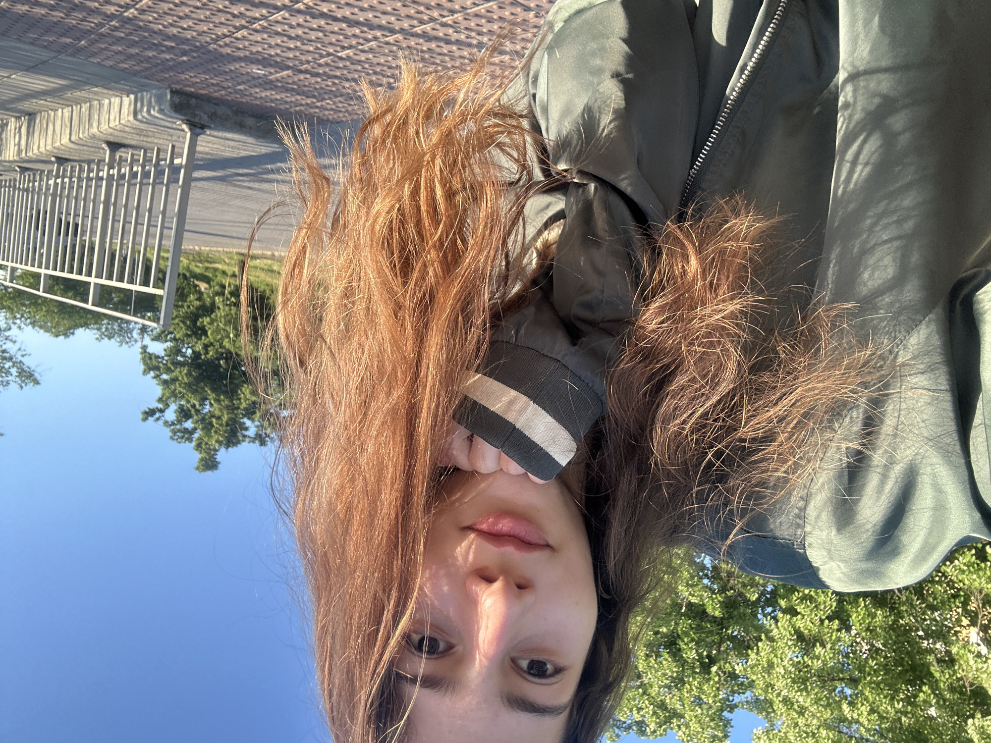 Person takes sunny afternoon selfie on bridge in Ruse