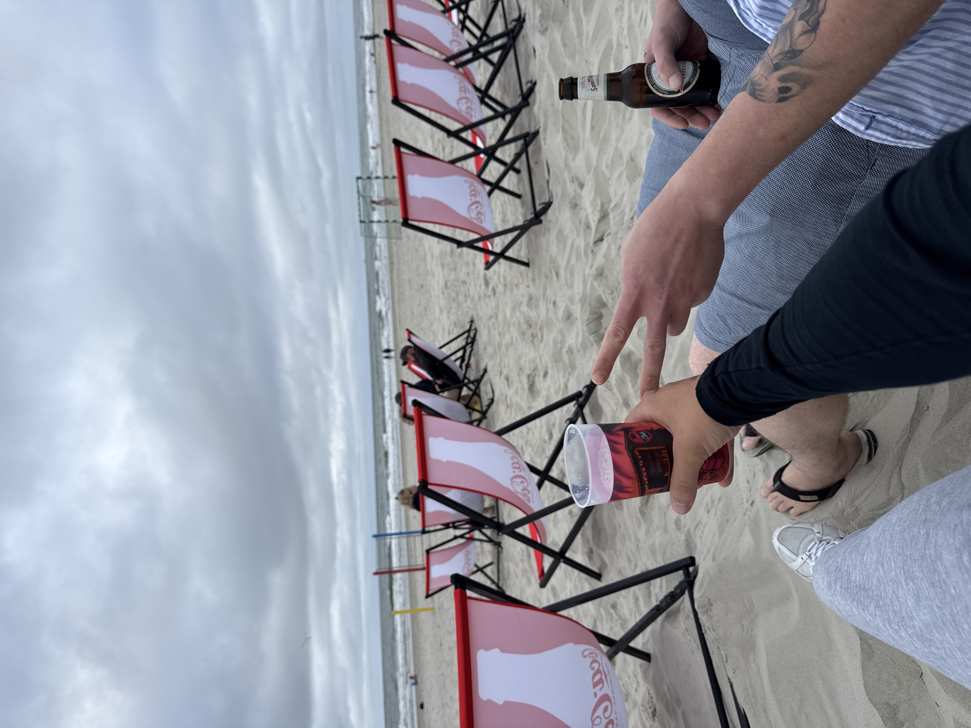 Beachside drinks and a clink on a grey Langeoog afternoon