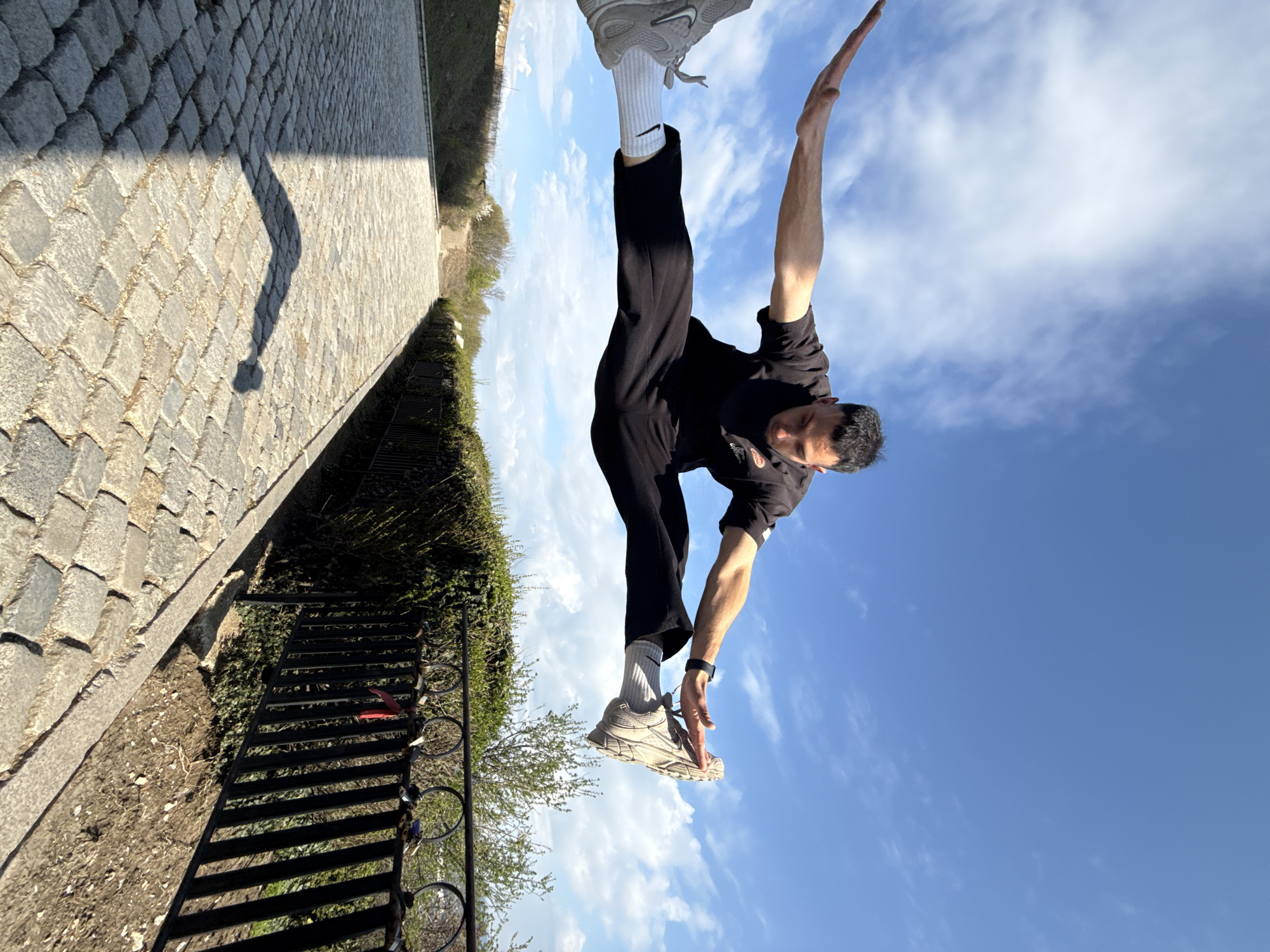 Man performs gymnastics, poses at overlooks in Shumen, Bulgaria