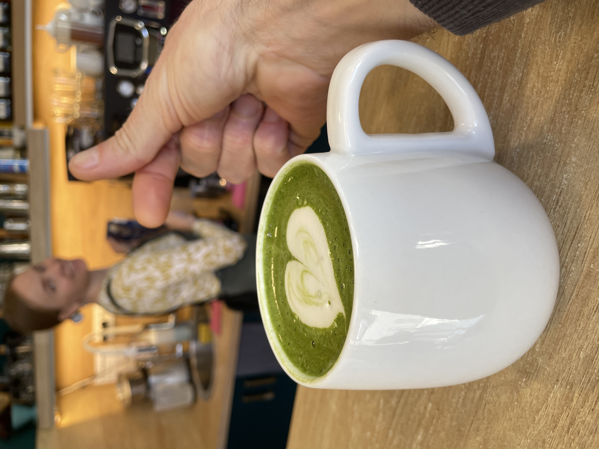 Morning matcha latte moment captured at Budva coffee shop