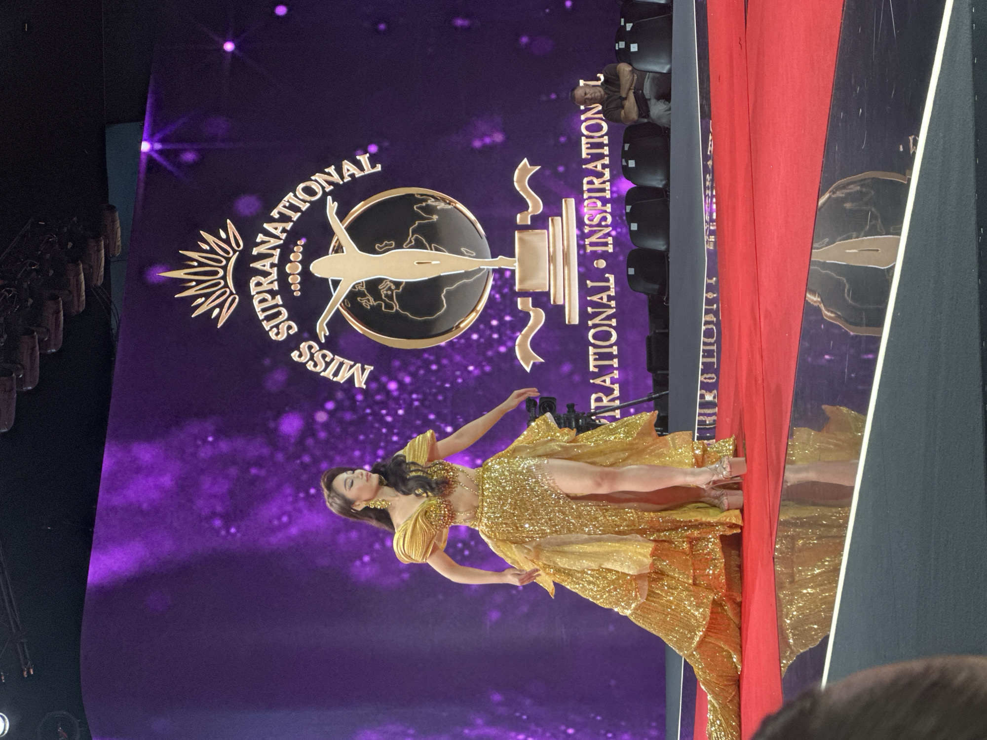 Gold gown on a red carpet stage in Nowy Sącz