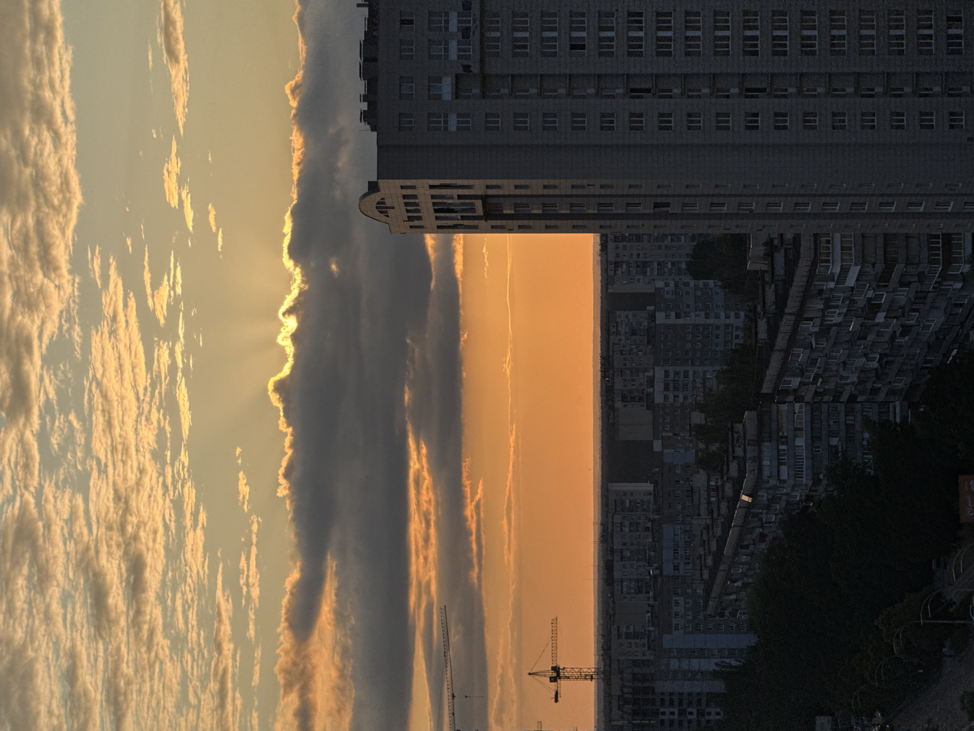 Sweeping sunset cityscape from high above
