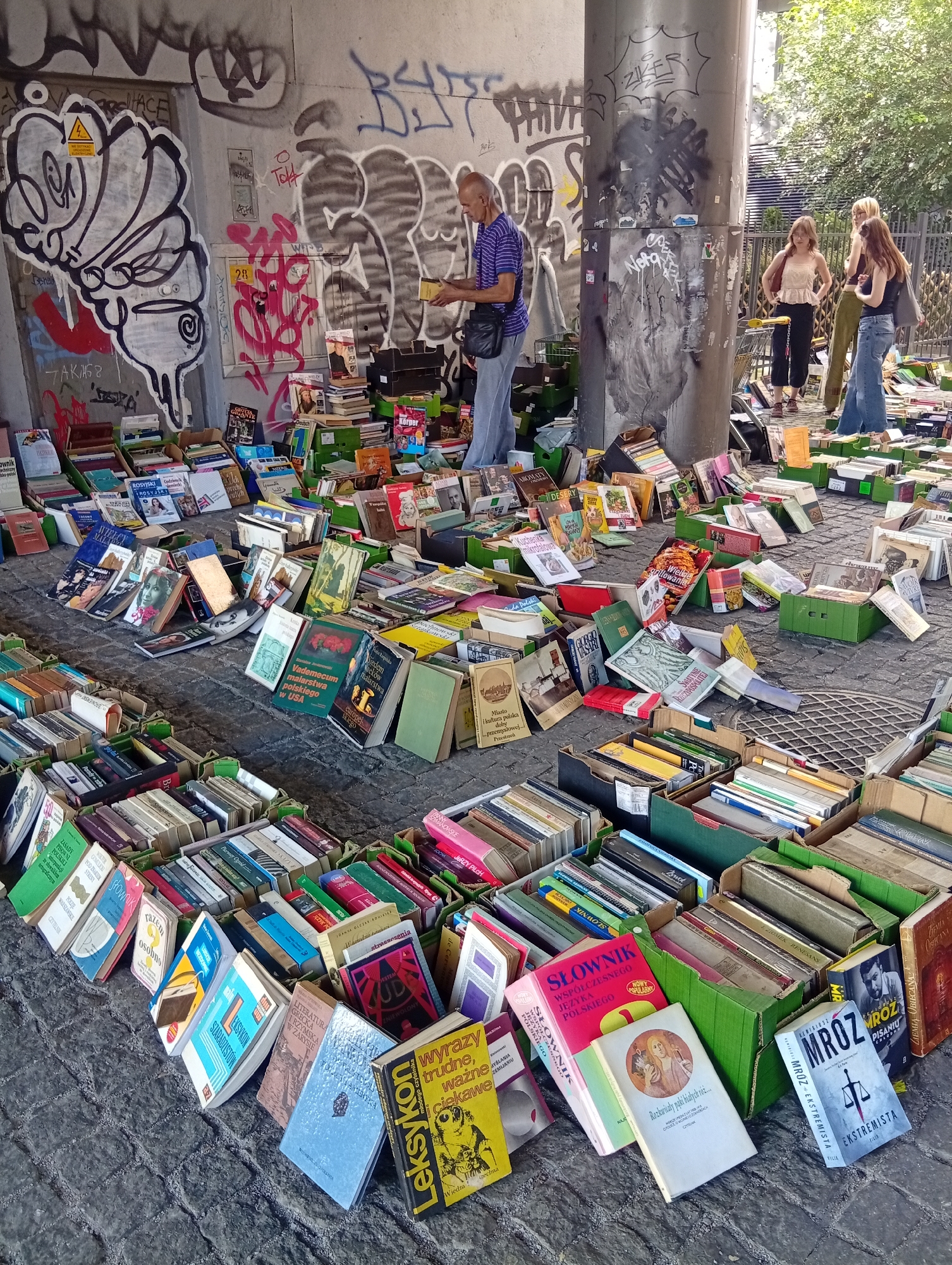 Books, vinyl, and live piano on Wrocław cobblestones
