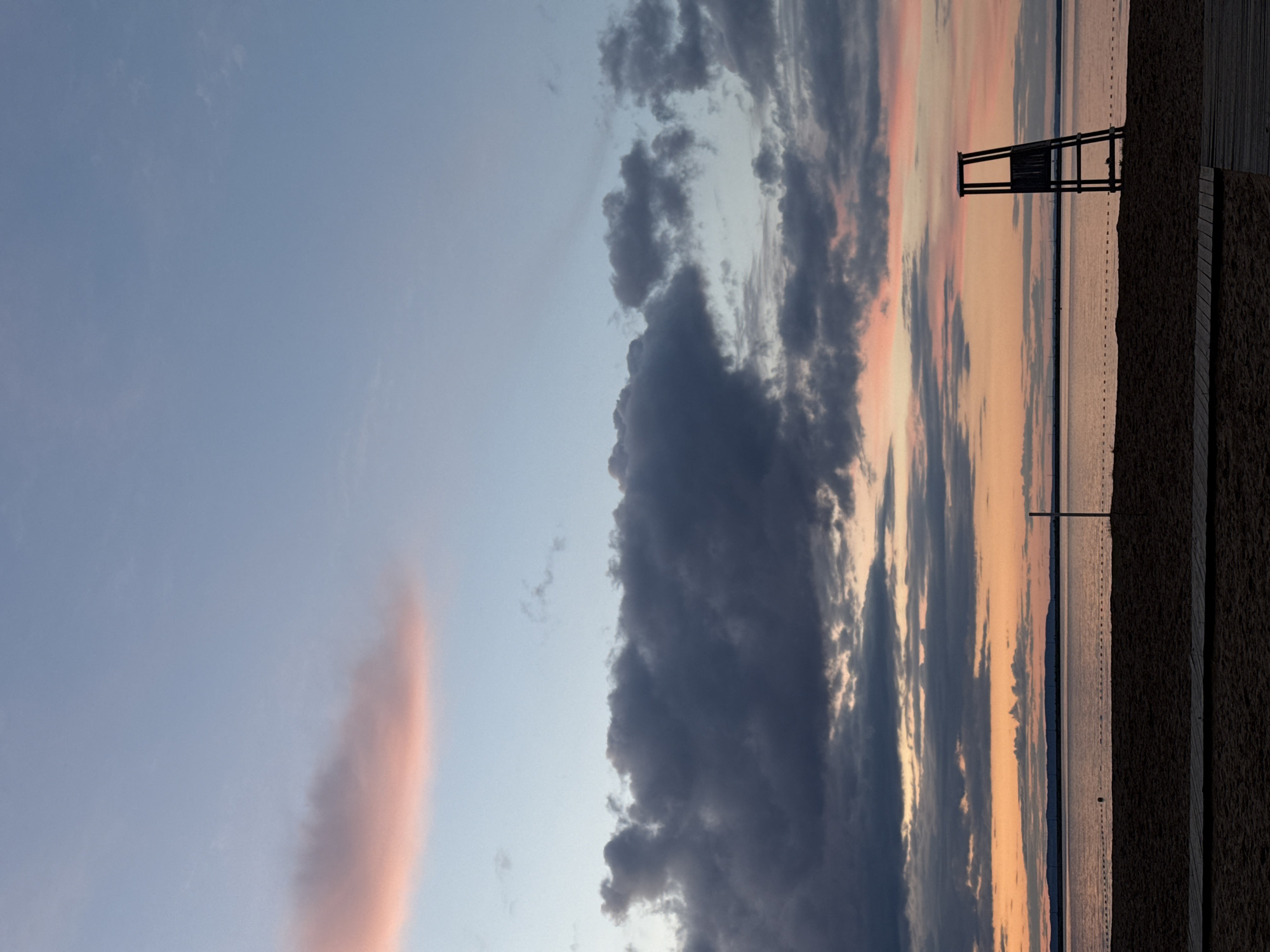 Sunset documented along Chaikovsky waterfront beach and promenade