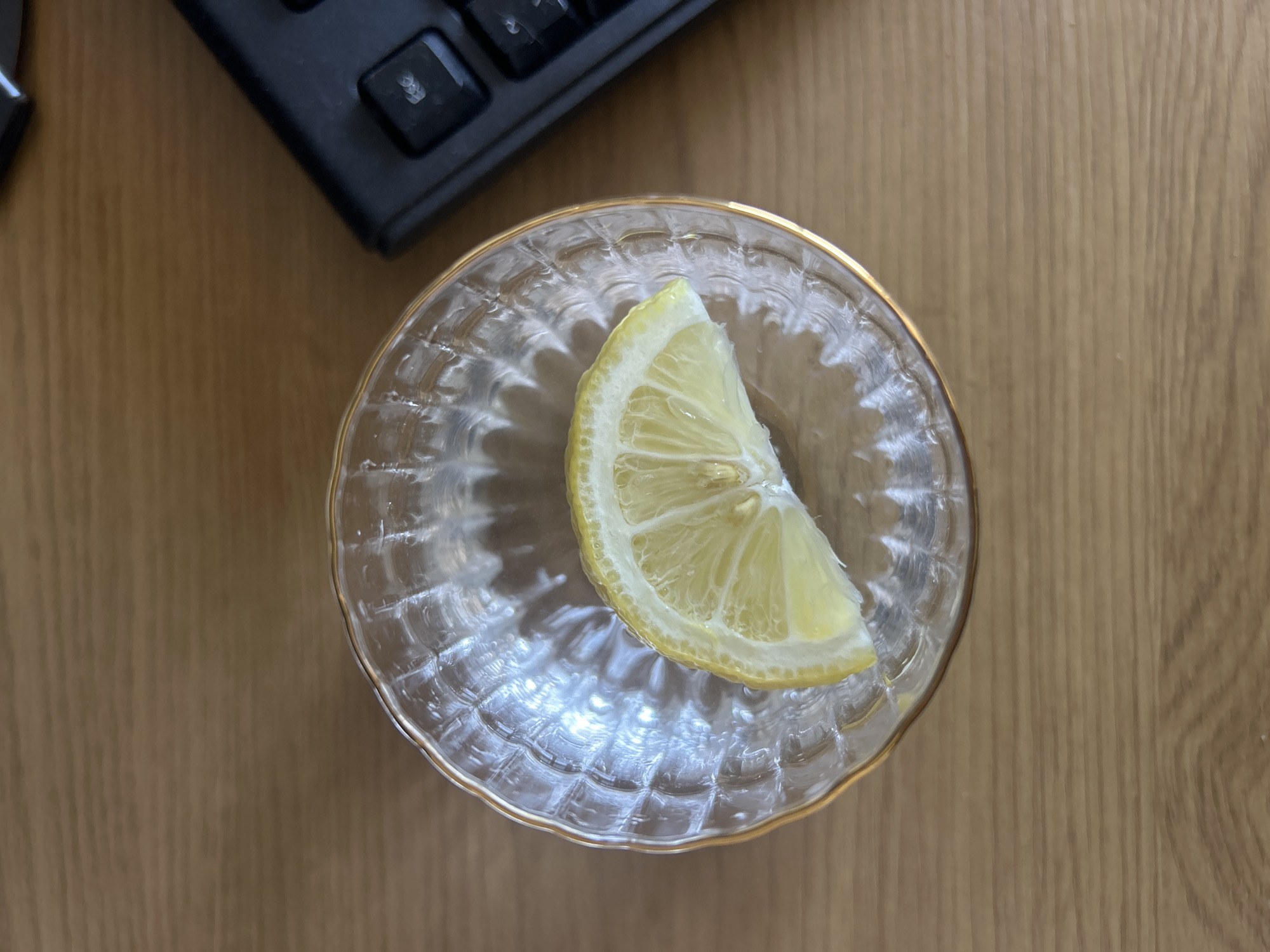 Lemon slice in glass bowl documented in Burgas workspace