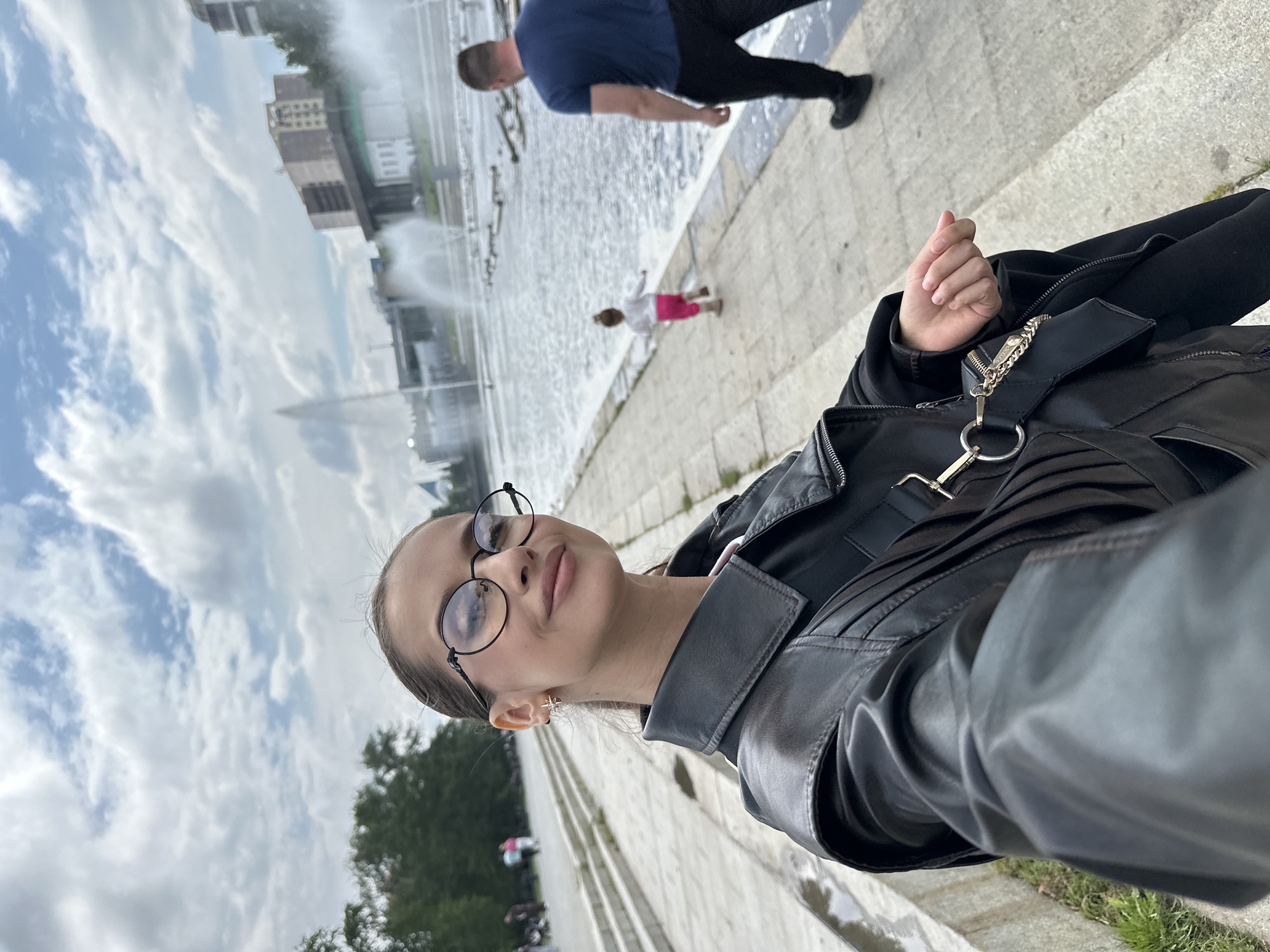 Morning stroll along Yekaterinburg's fountain-filled Iset River embankment