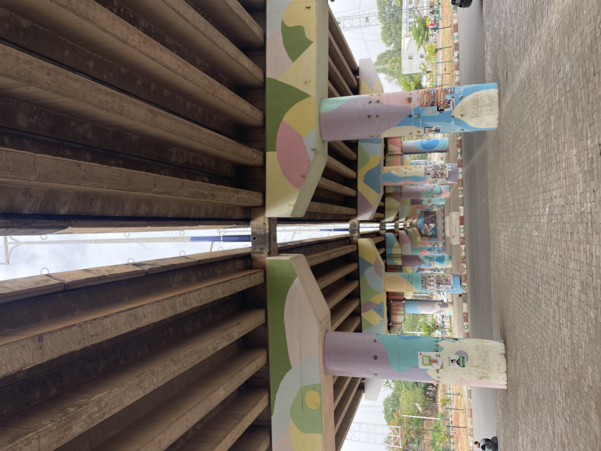 Decorated underpass in Jos captured during midday activity
