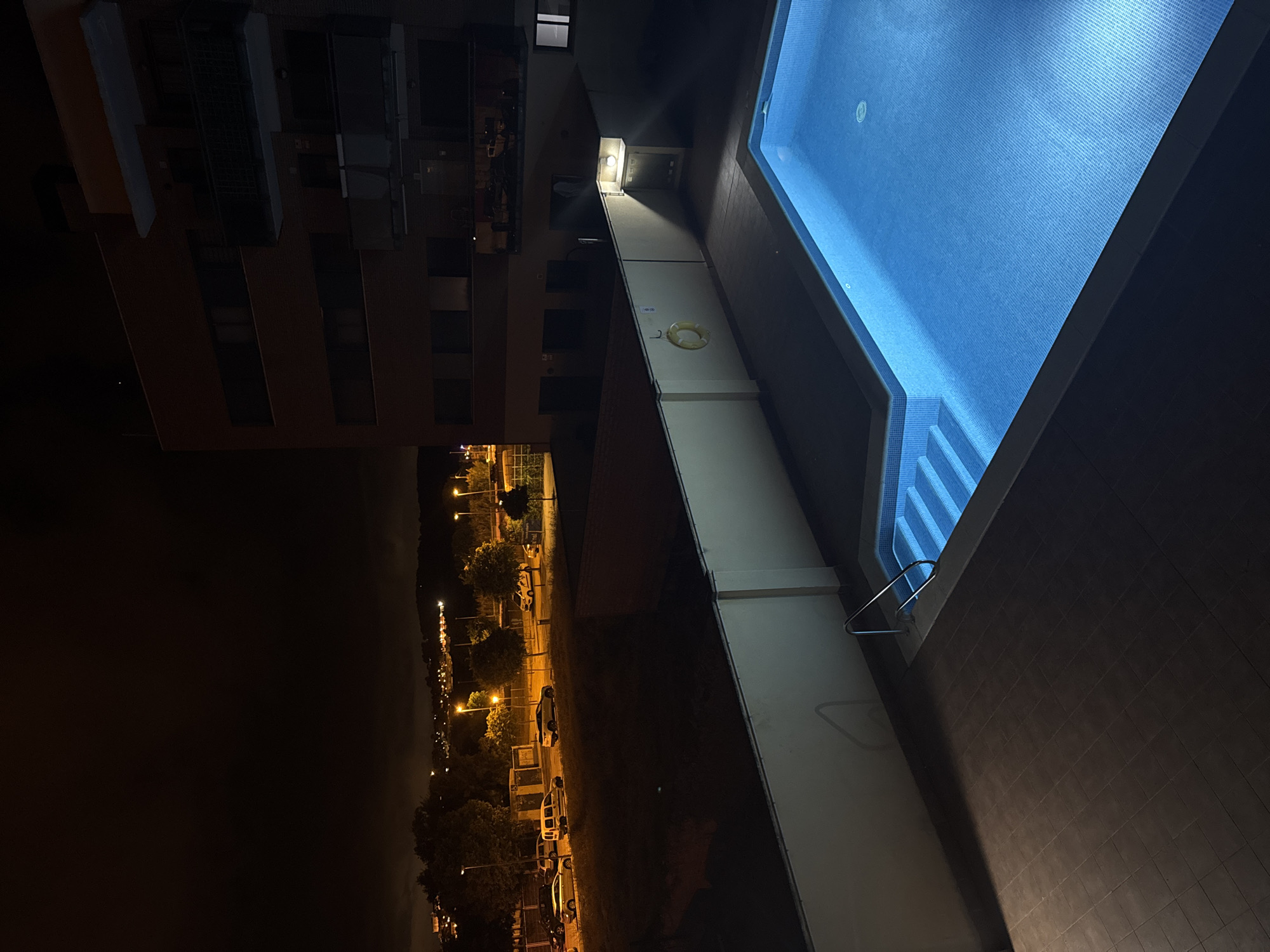 Decorative figurines and illuminated pool documented in Torredembarra