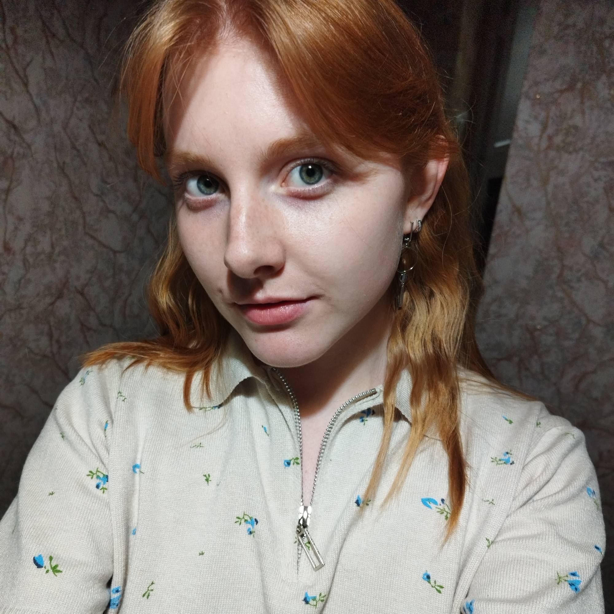 Portrait photos show reddish-blonde person alone, then with companion