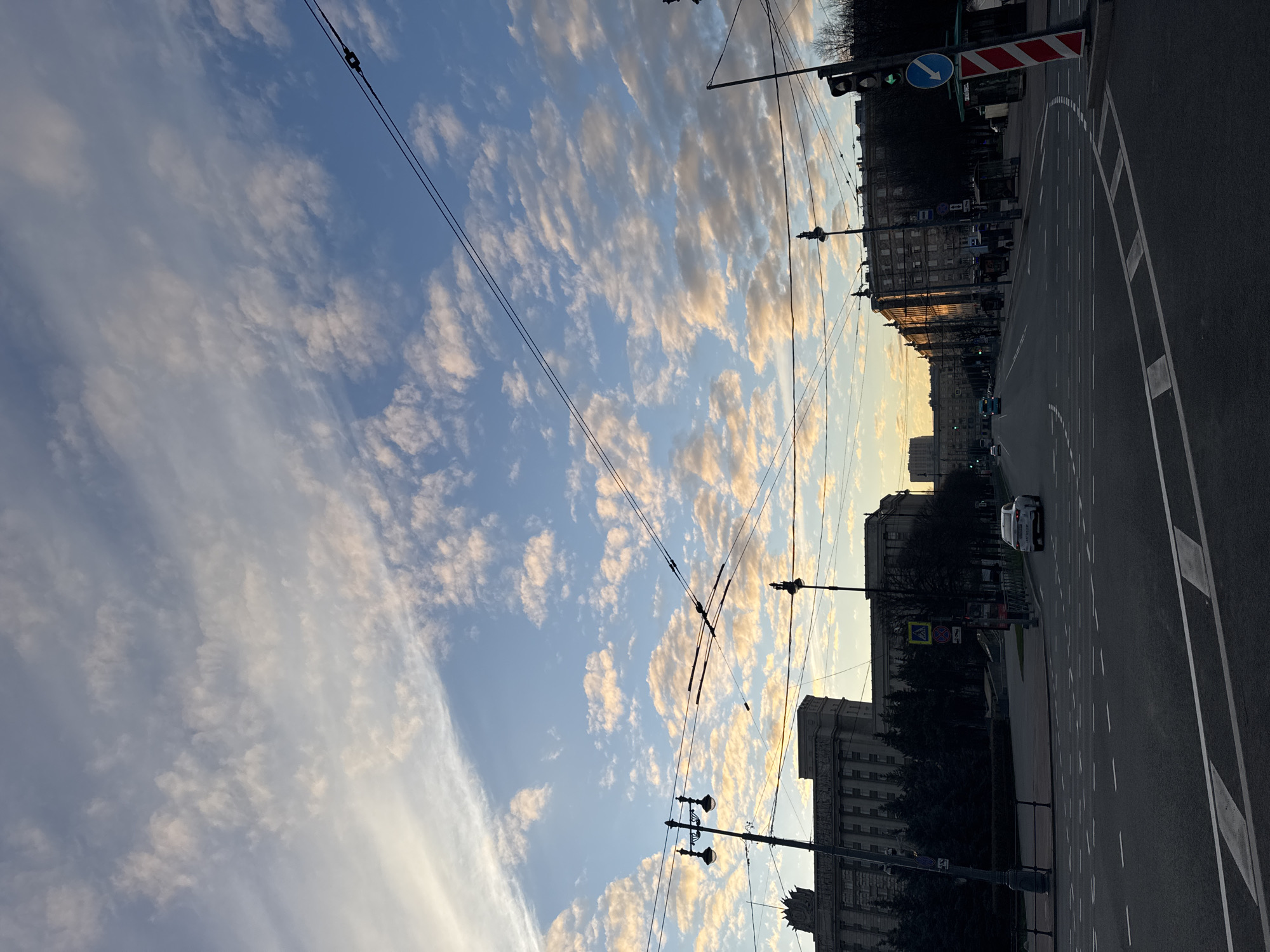 Saint Petersburg street scene captured with tram lines, cloudy sky