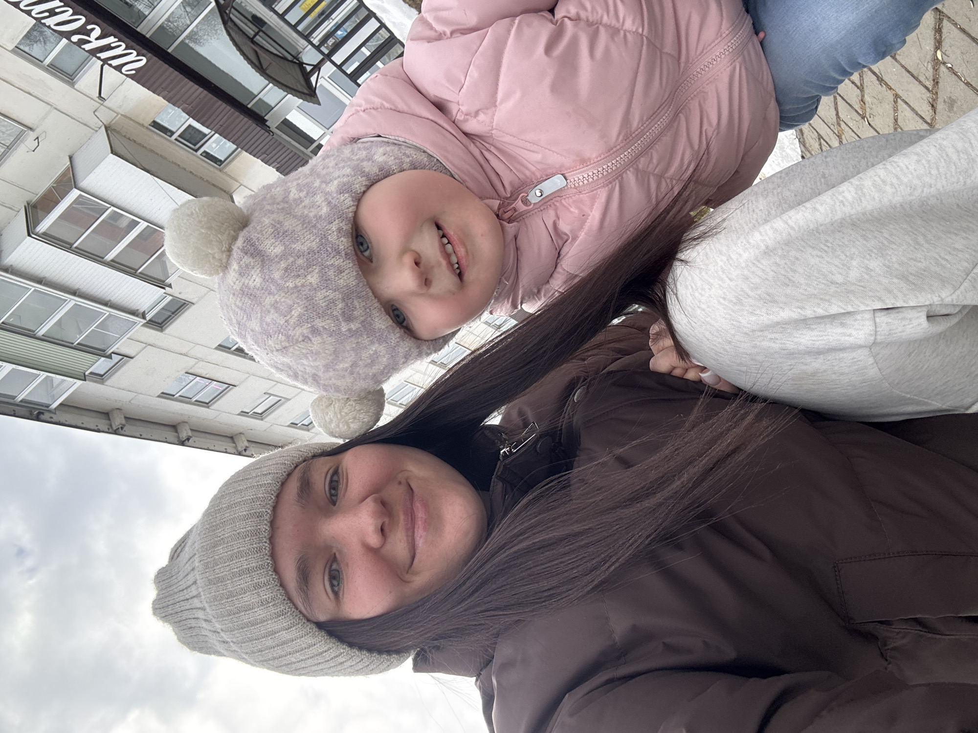 Daily life moments captured across Chaikovsky, Russia during winter afternoon