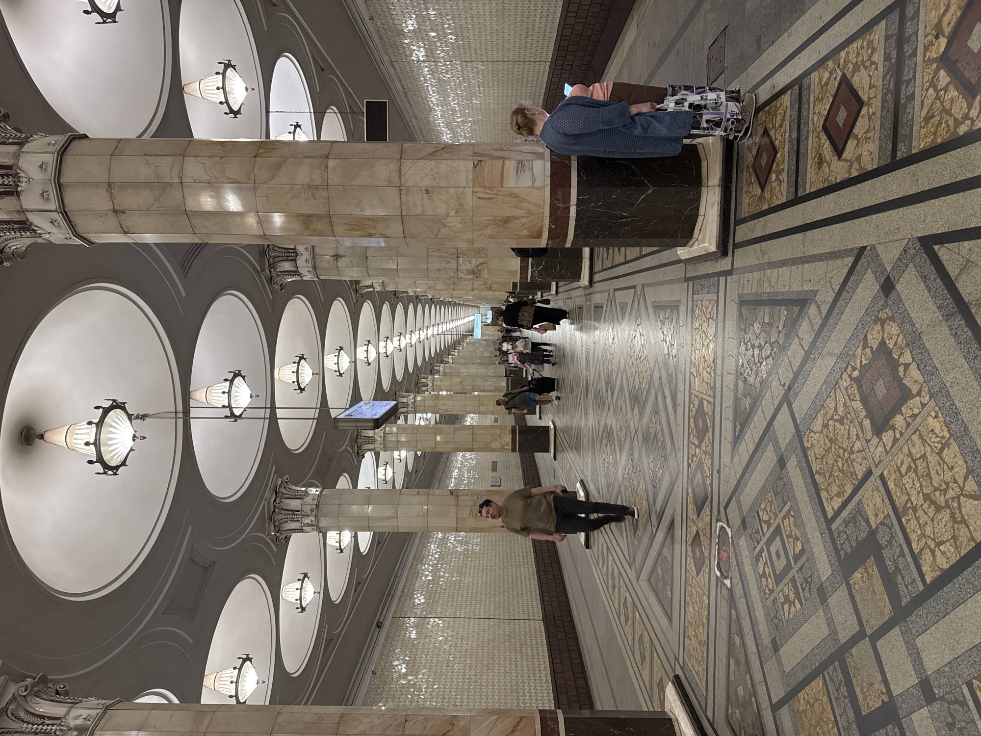 Moscow metro interiors and City skyline on a cloudy morning