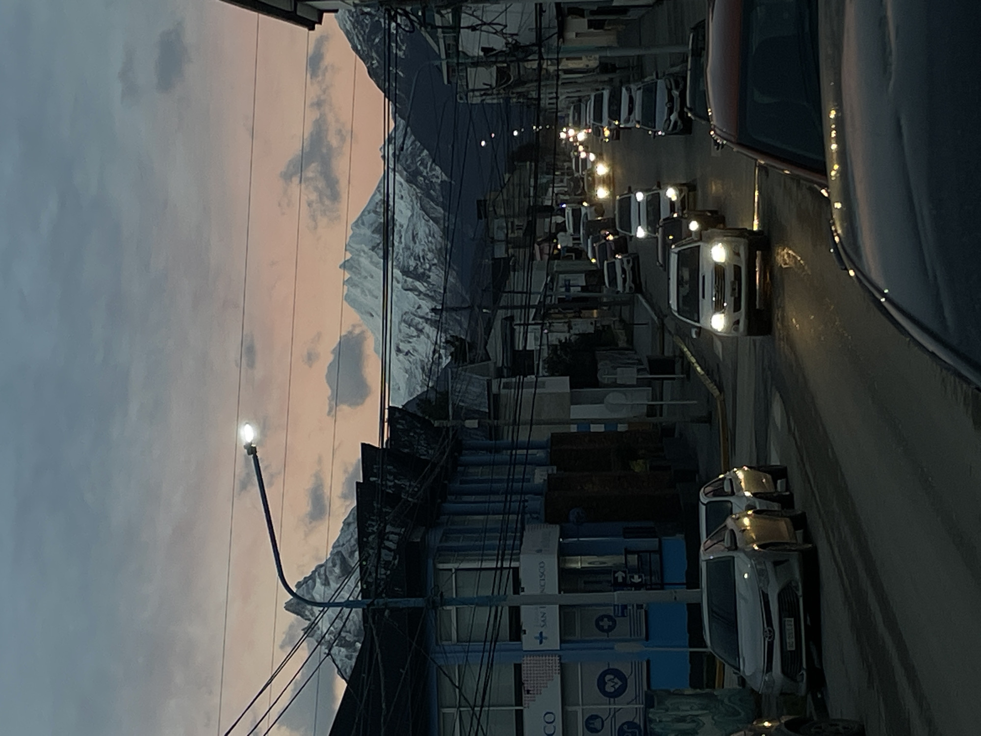Street scene captured in Ushuaia with mountain backdrop