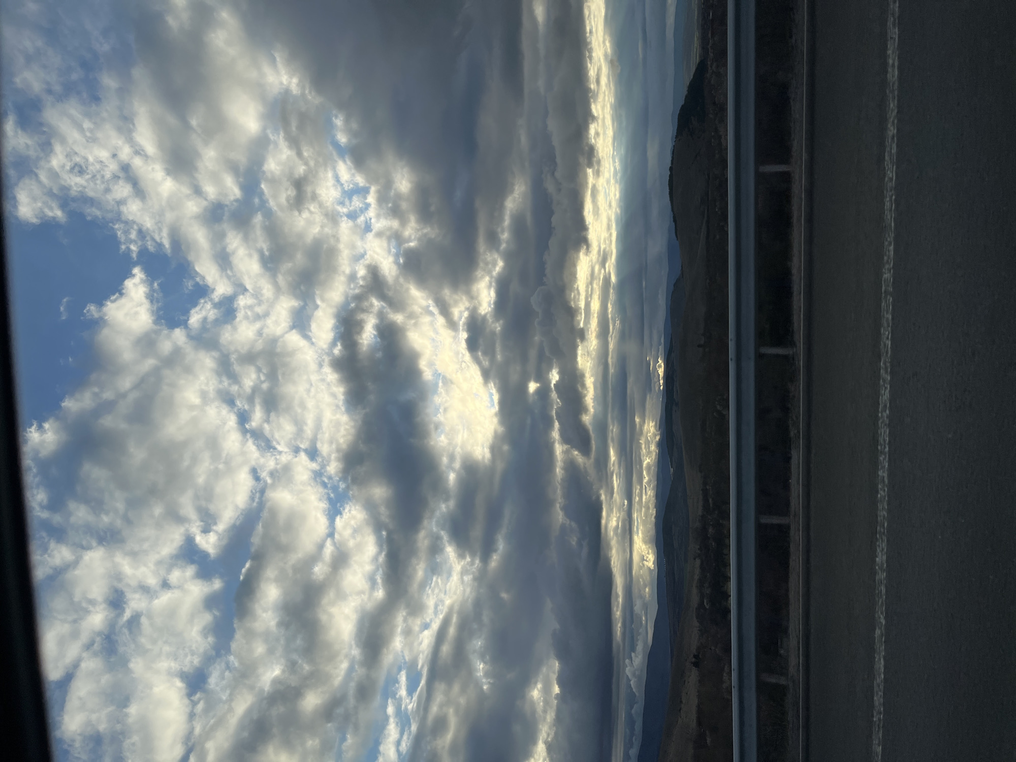 Driver uses GPS navigation system near Bulgarian mountains