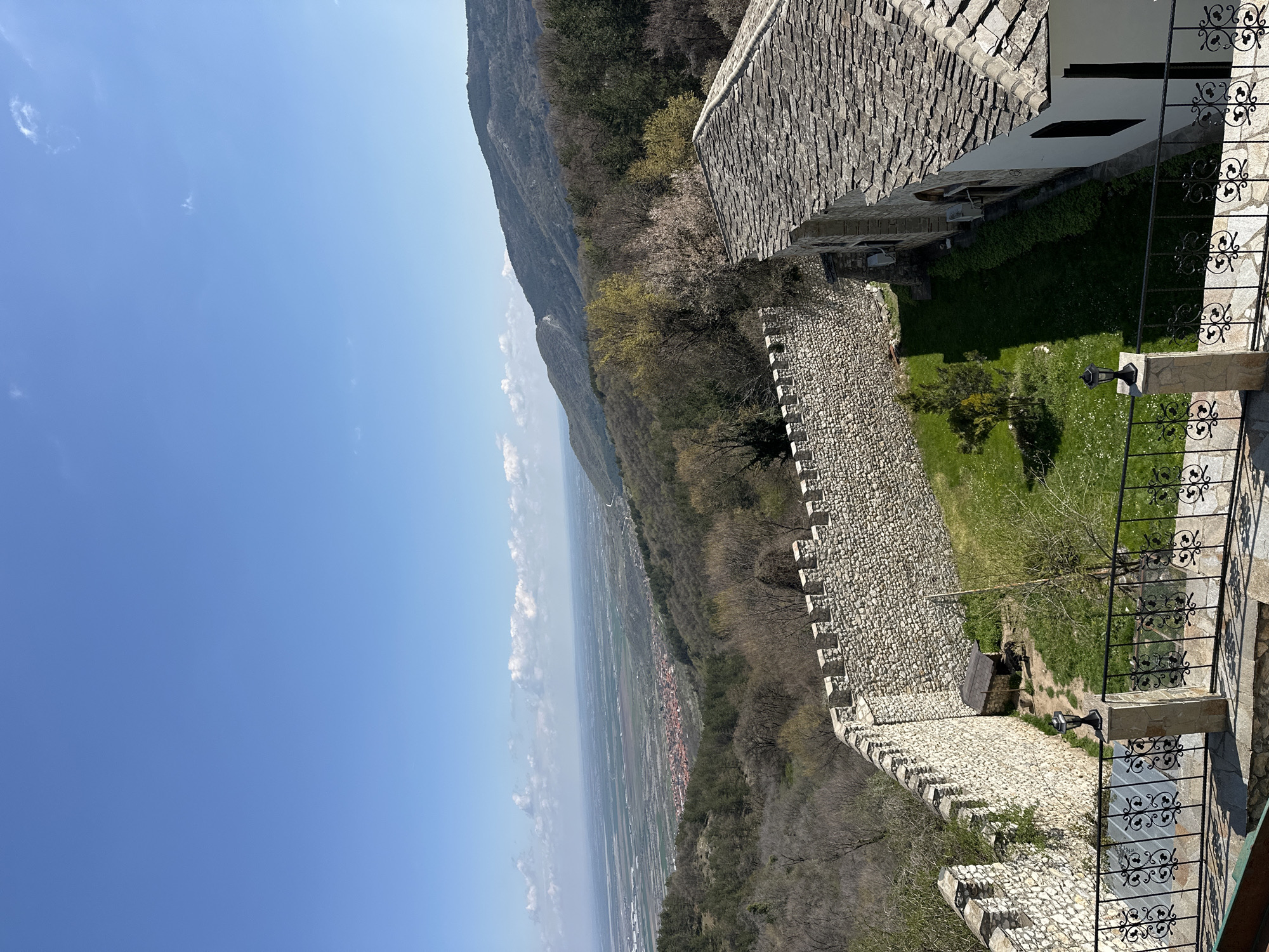 Woman visits historic stone ruins in Kuklen, Bulgaria