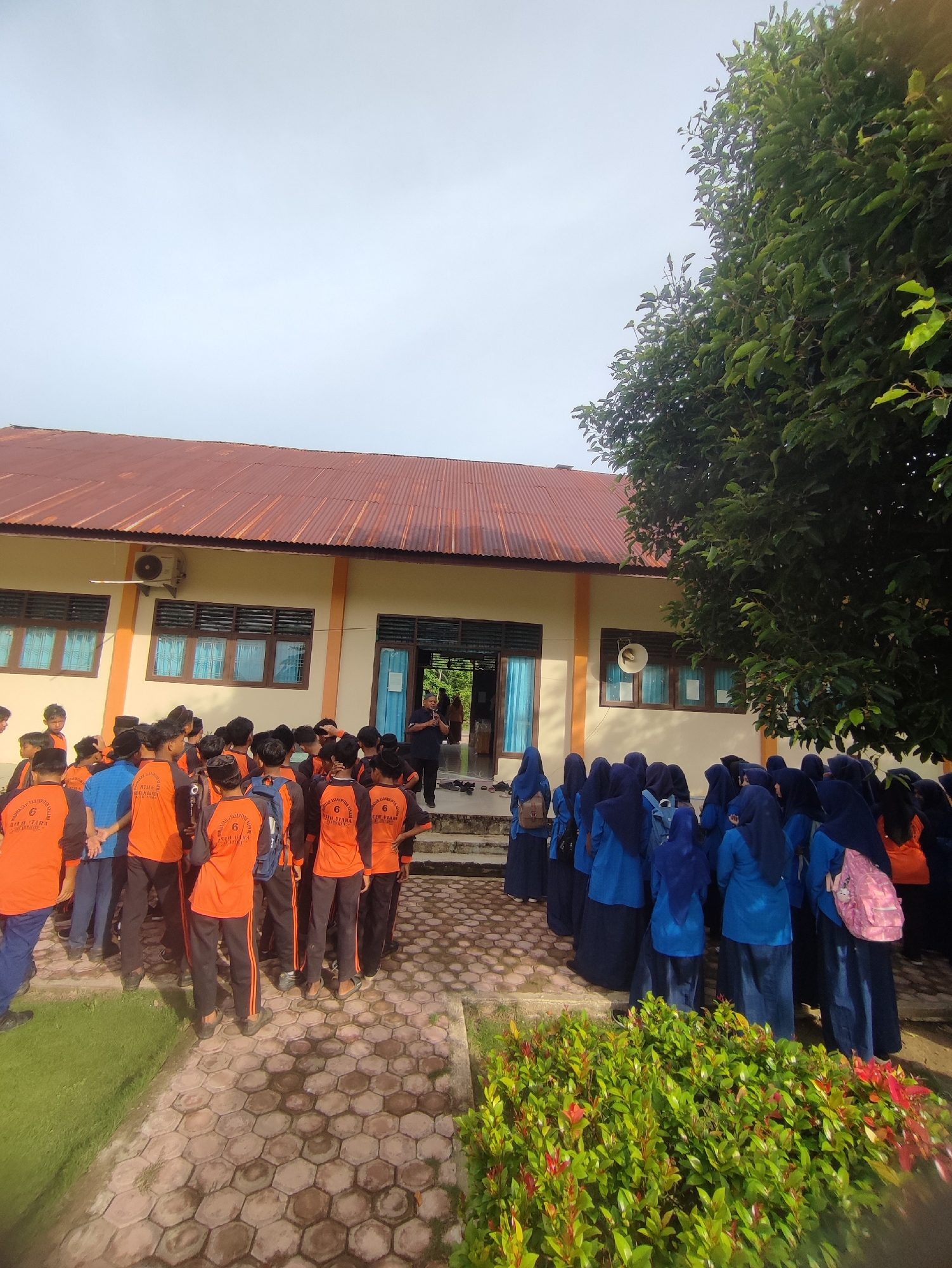 Students hold outdoor assembly at Blangriek school