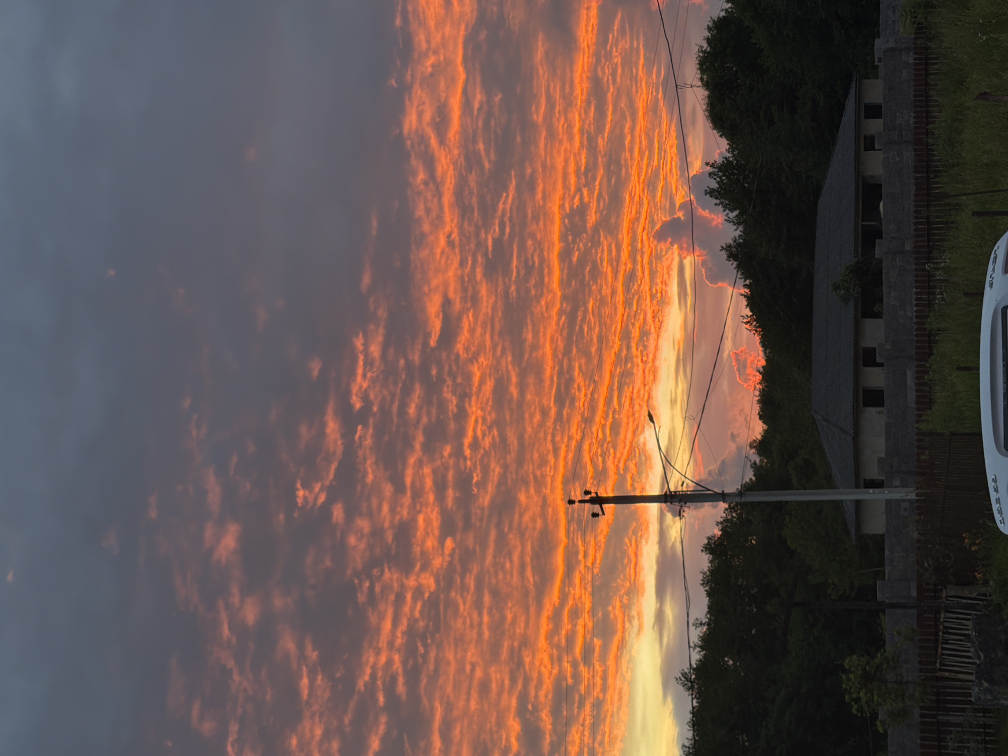 Sunset over Naghbou countryside displays dramatic orange sky