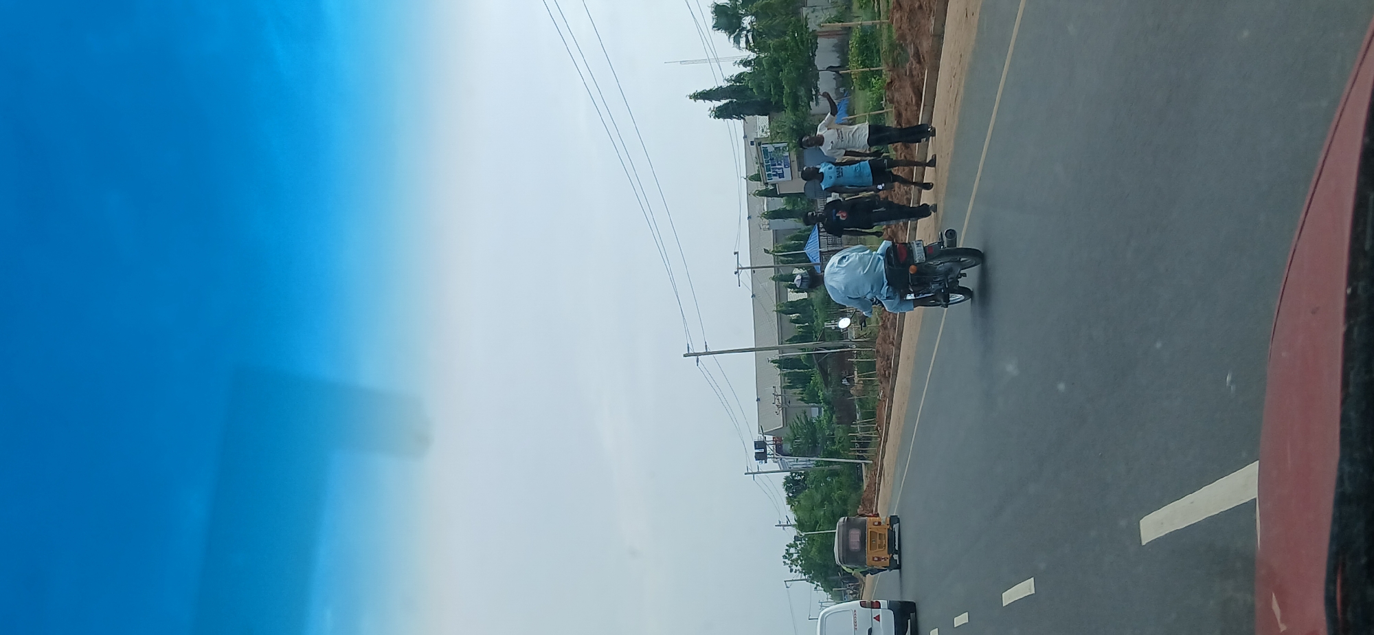 Group of men observed roadside in Matage, Nigeria
