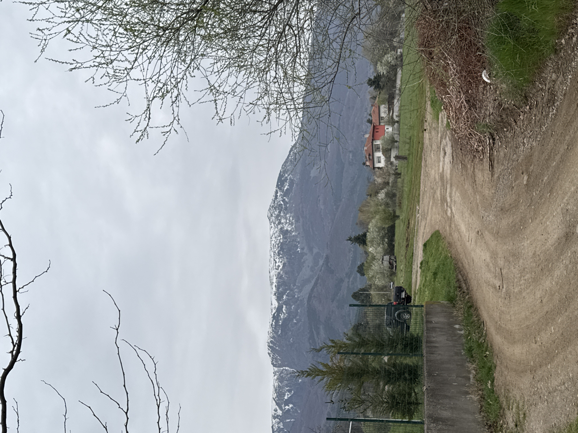 Rural Sofia scene documented with mountains and dirt road