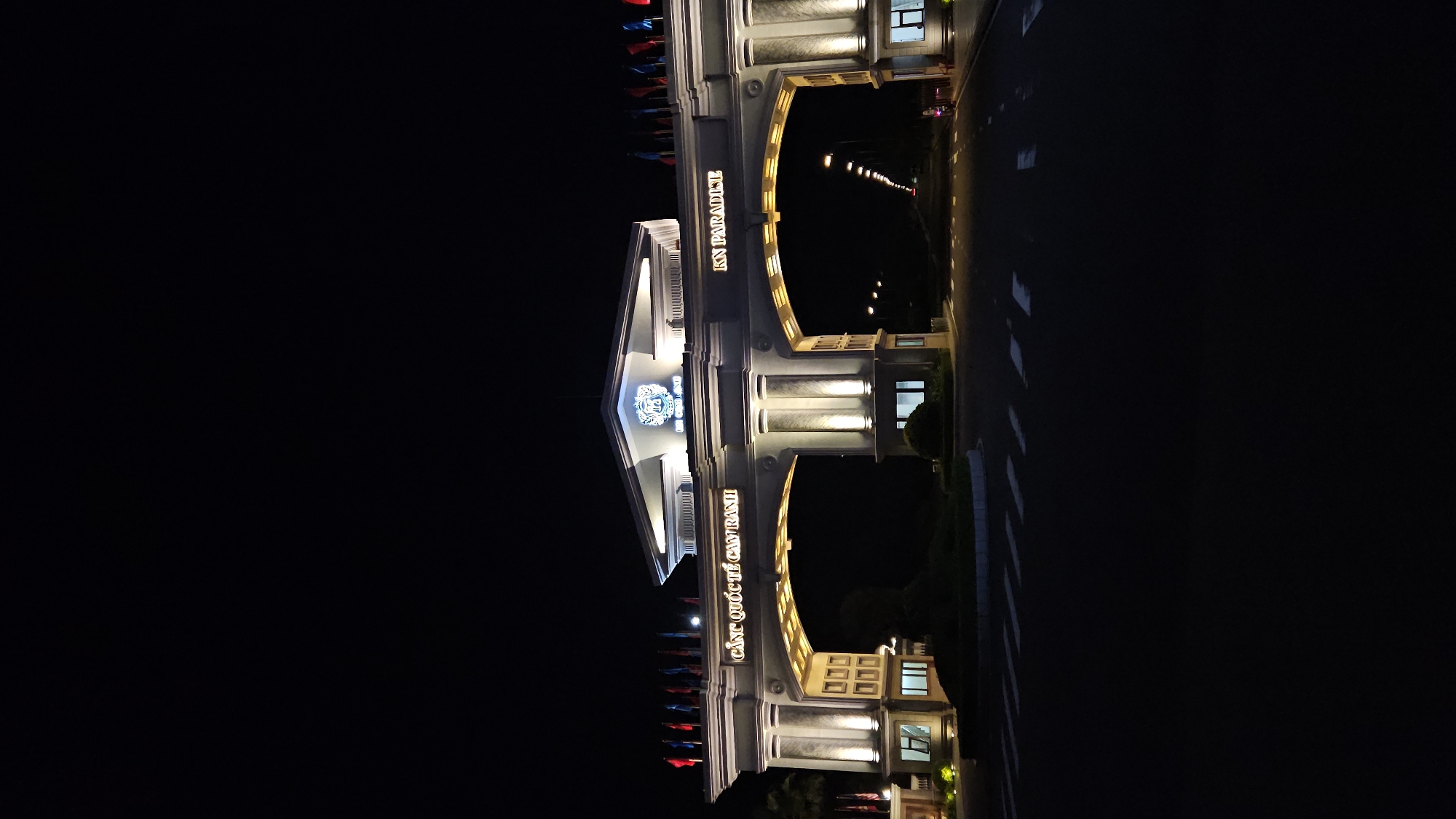 Illuminated architectural gate photographed at night in Bac Cam Ranh