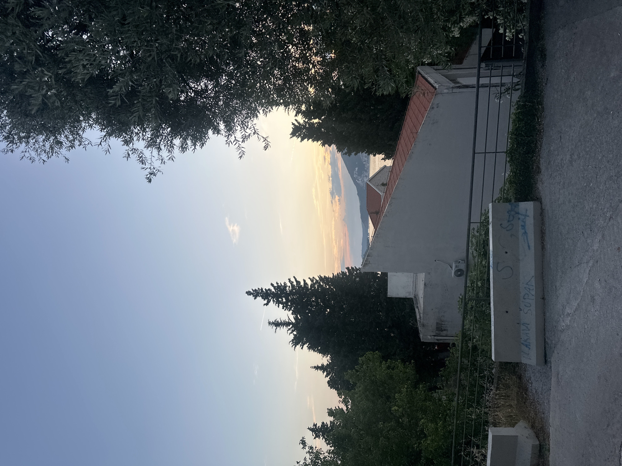 Coastal scenes documented in Podličak, Montenegro during evening hours