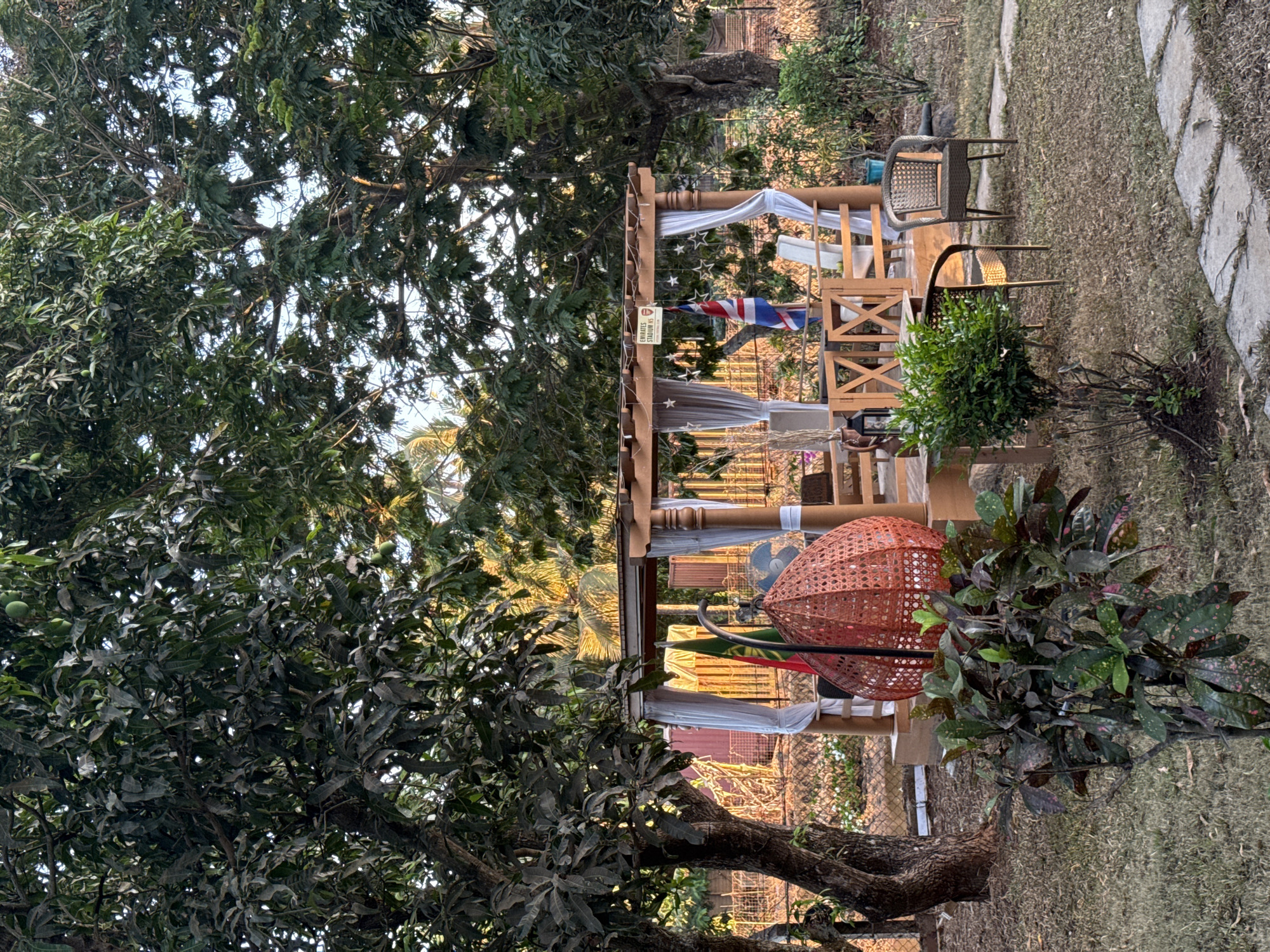 Tourist documents decorative home interior and garden in Arpora