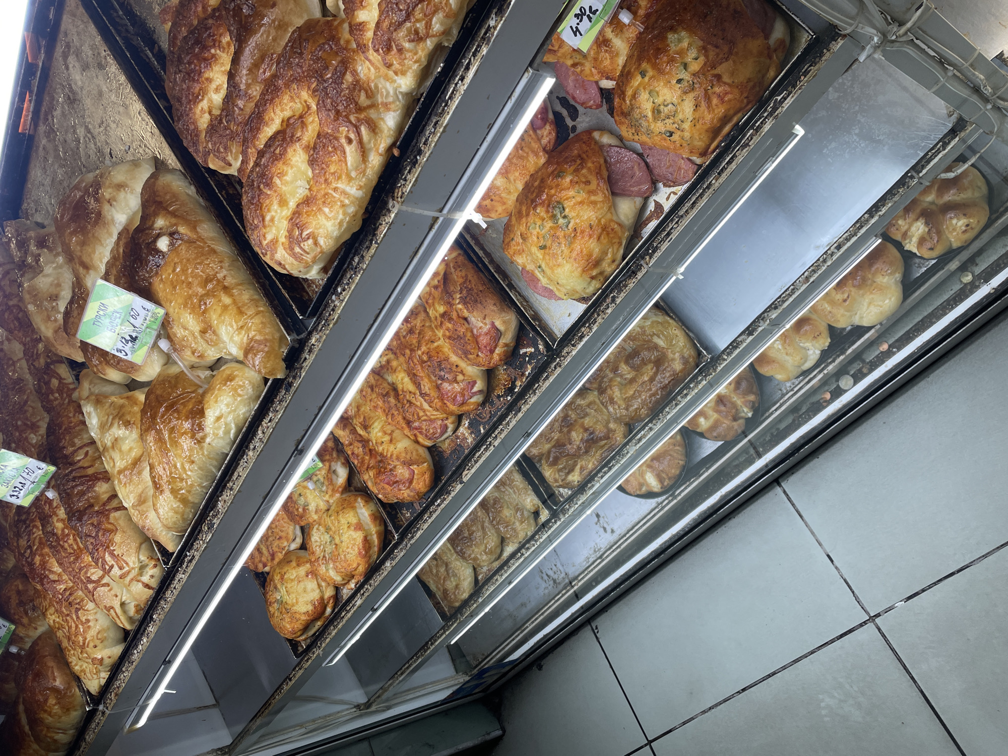Bakery display case showcases pastries in Sofia