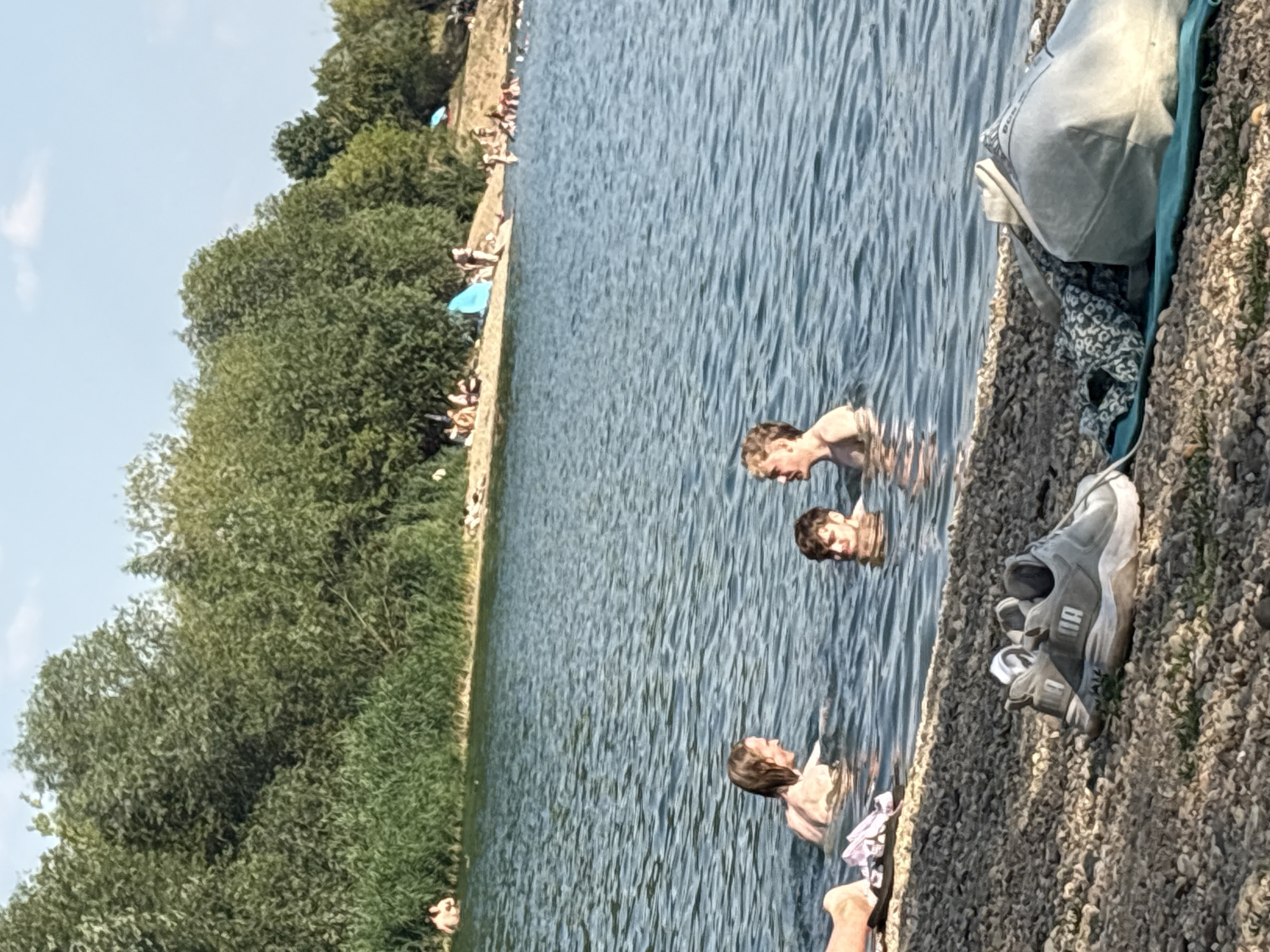 Summer swimming and relaxing on a Dresden lakeside shore