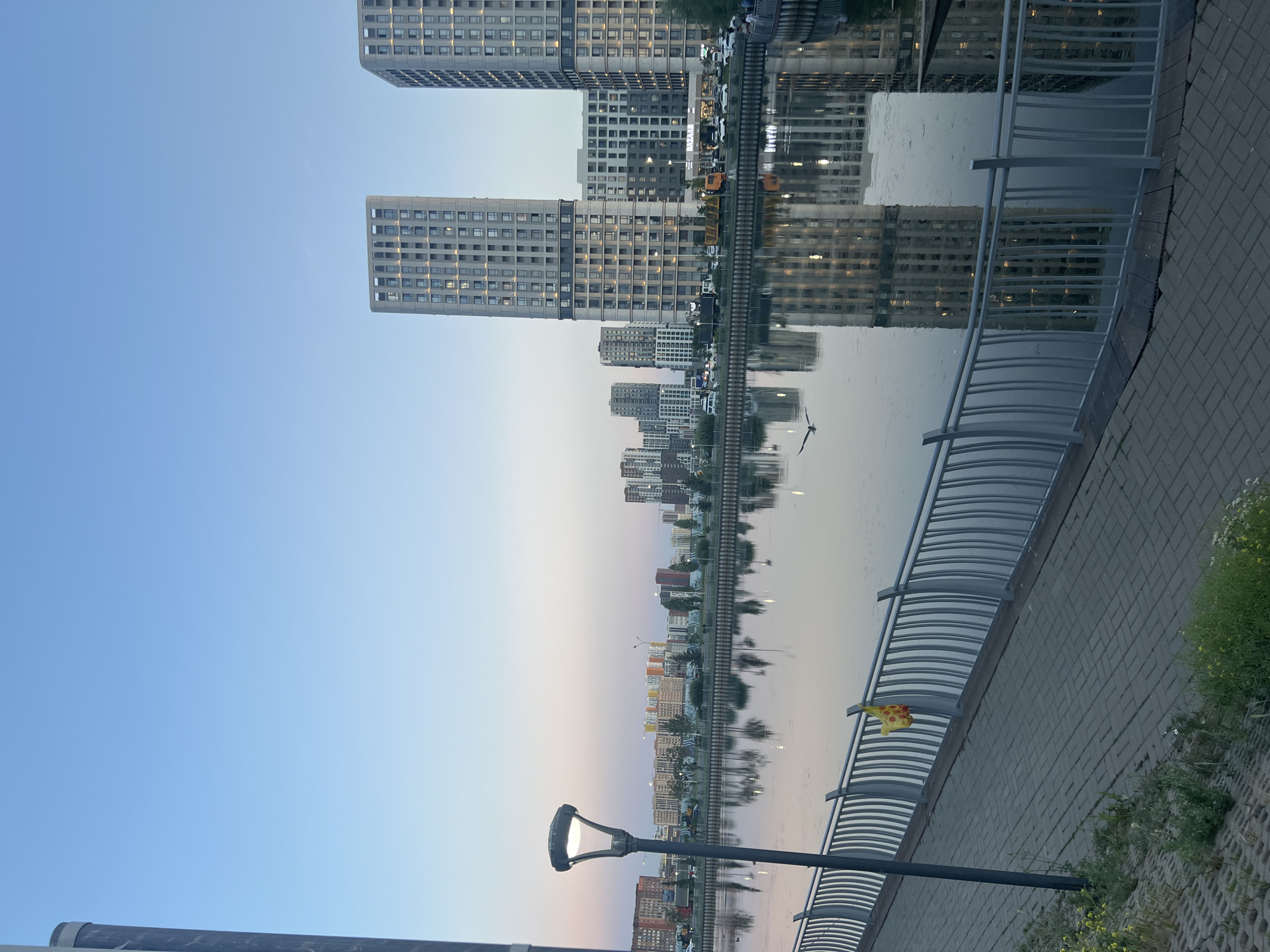 Evening stroll along Astana's waterfront promenade
