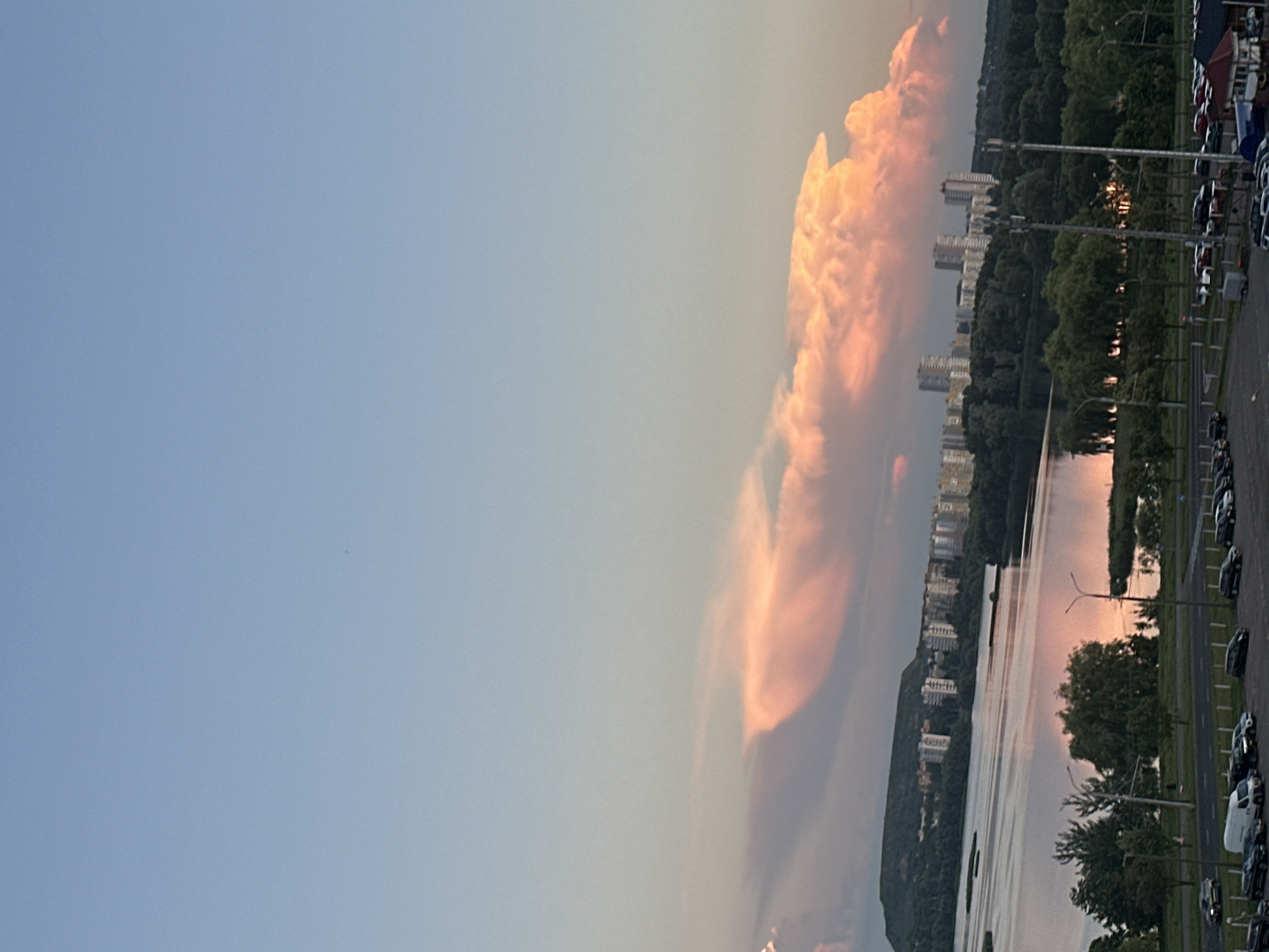Sunset over the Svislach River, Minsk, crescent moon rising