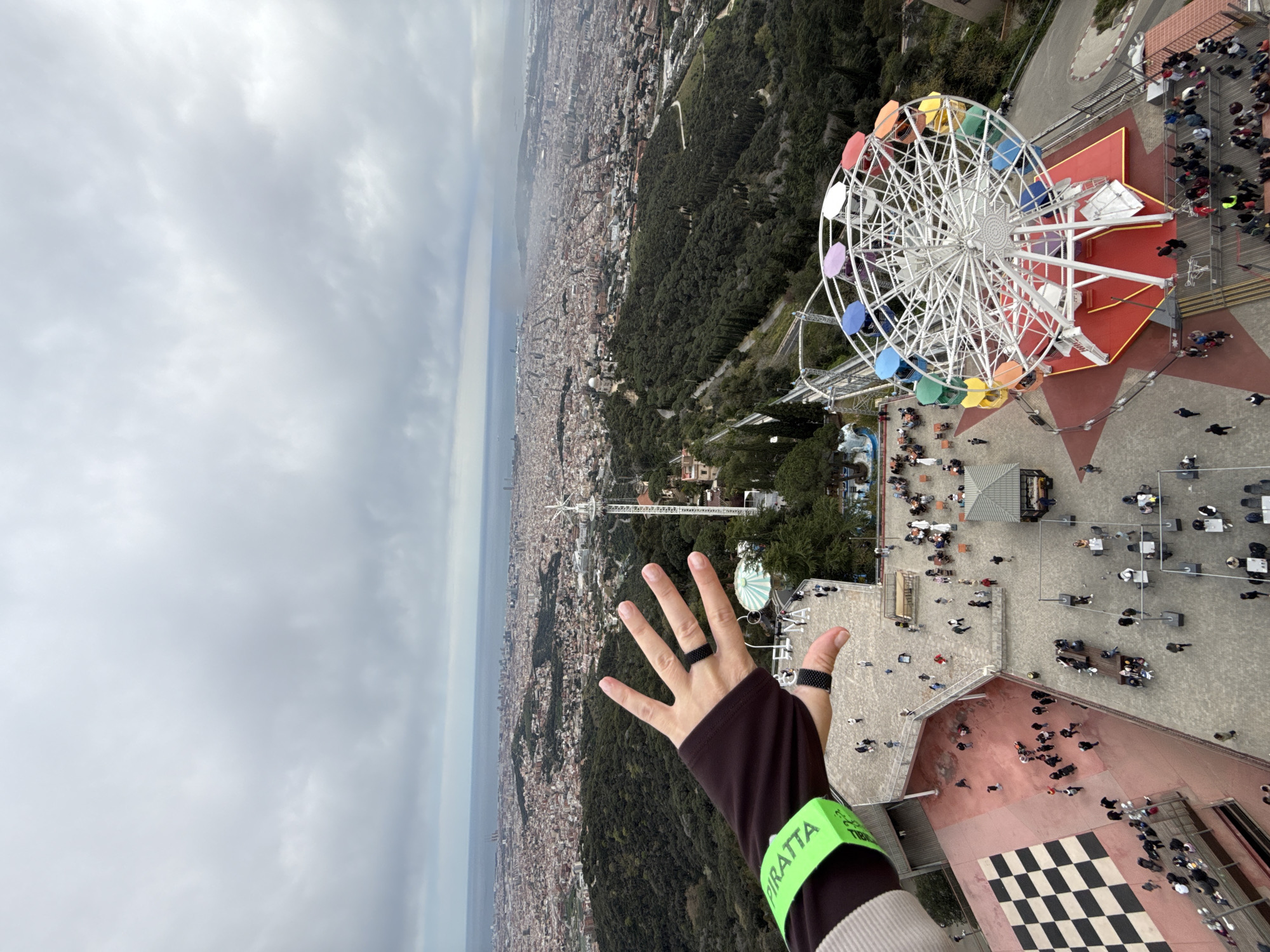 Tourist visits Tibidabo Mountain amusement park and church in Barcelona